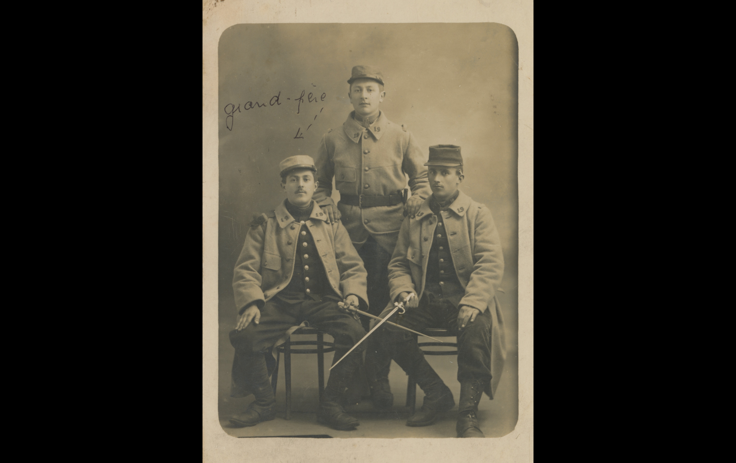 (15.49.A) Photo of three infantrymen of the 19th Infantry Regiment
Date: April 3rd 1915
Location: Studio (Brest, France (29)) 
Unit: 19th Infantry Regiment
Author: Alexandre Louis Jean Marie BODIER
Present in the photo:
1. Alexandre Louis Jean Marie 