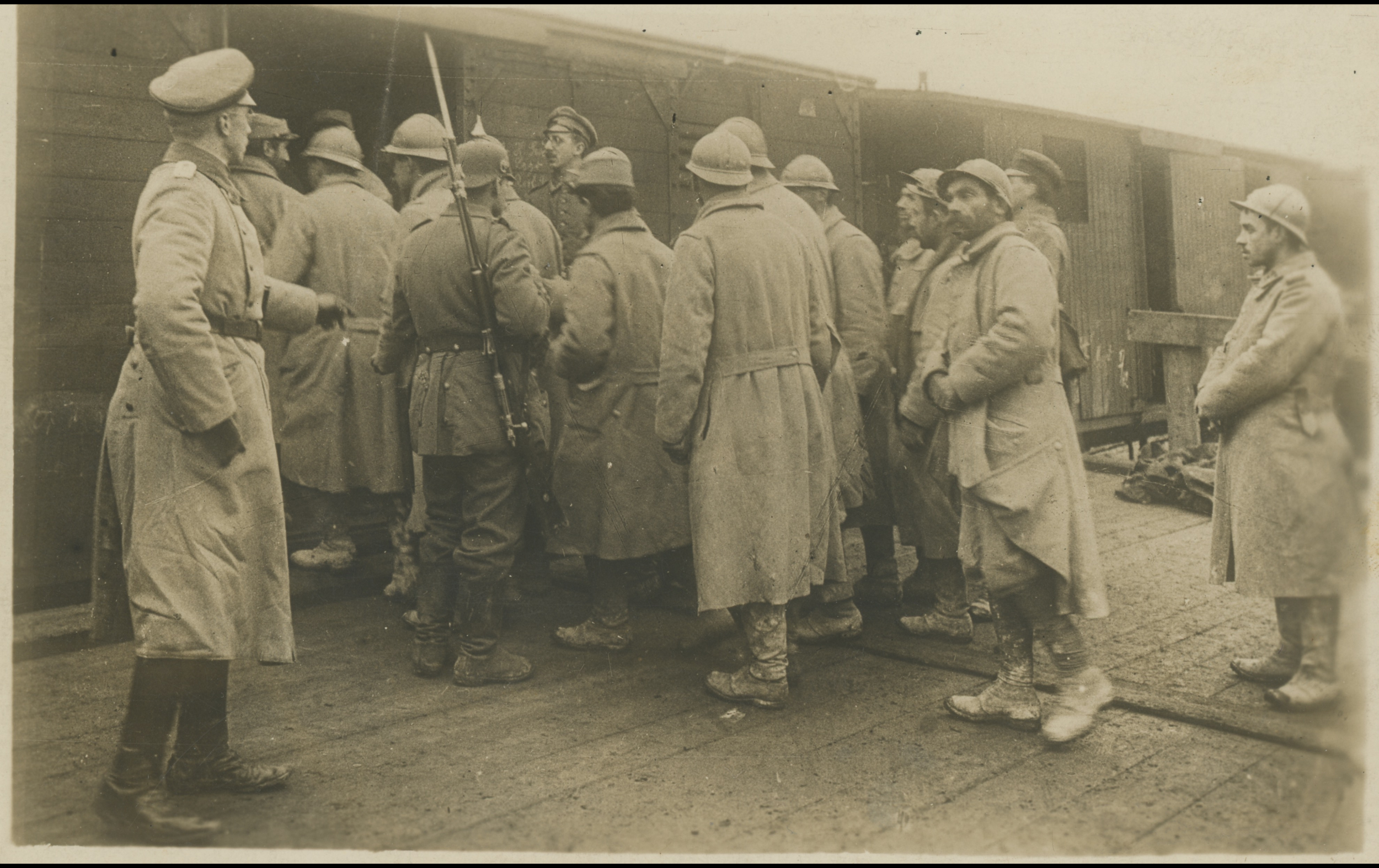 (POW.20.A) Photo of German soldiers escorting French prisoners on a train
Date: c.1915
Location: ?
Unit: ?
Author: ?
Present in the photo: ?