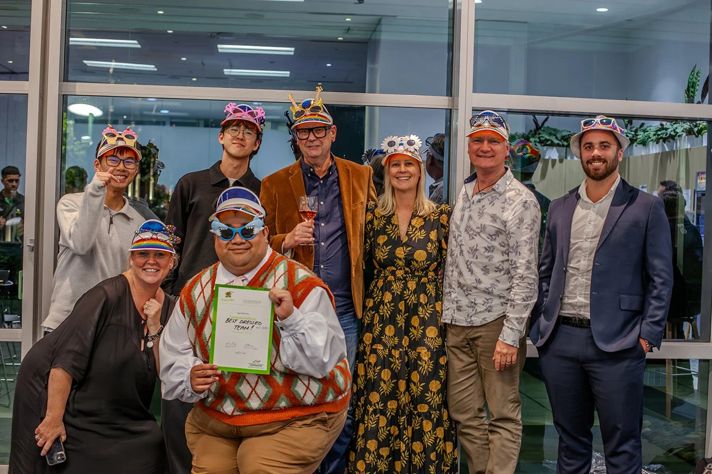 Teams at an event celebrating award win