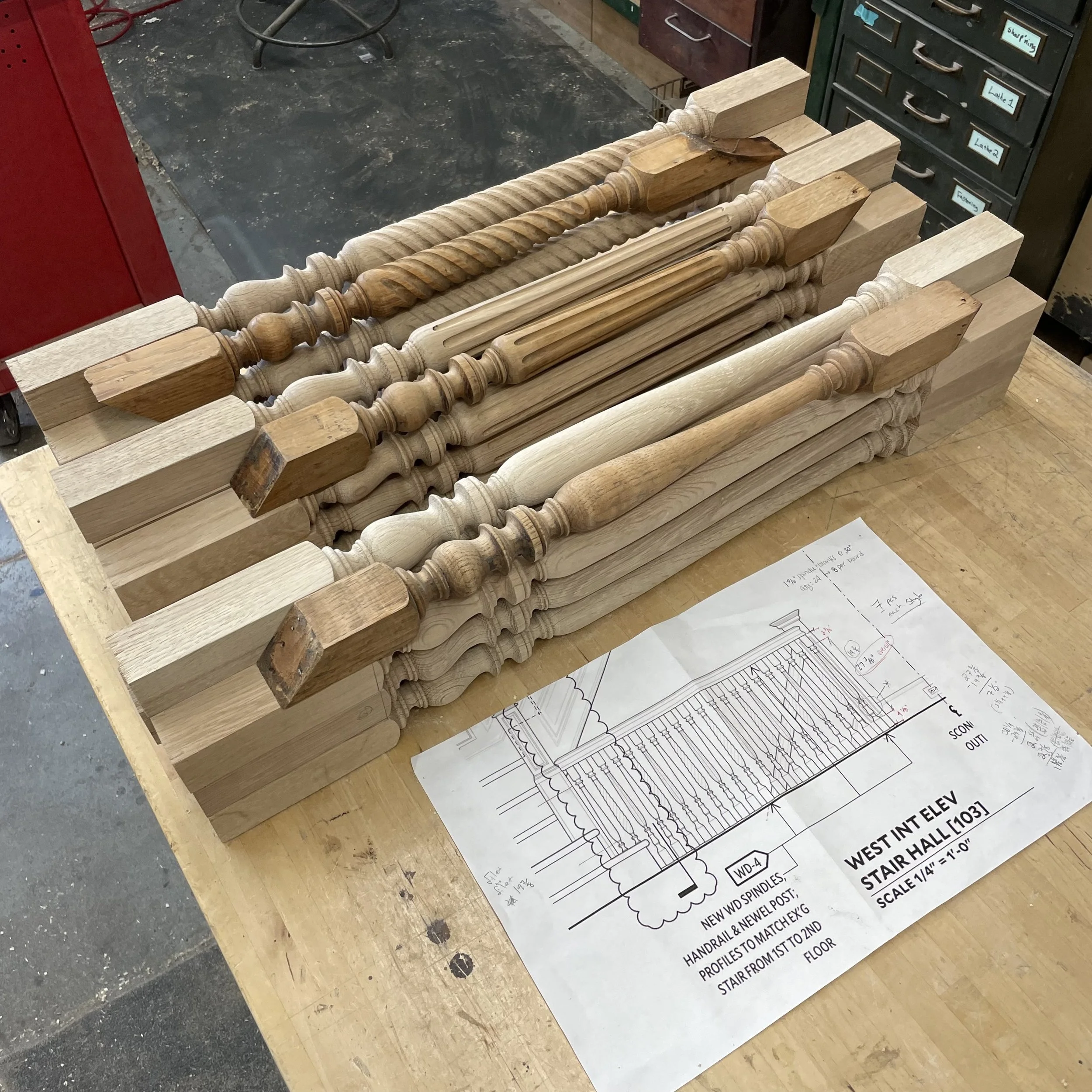 Staircase balusters with spiral carving and fluting