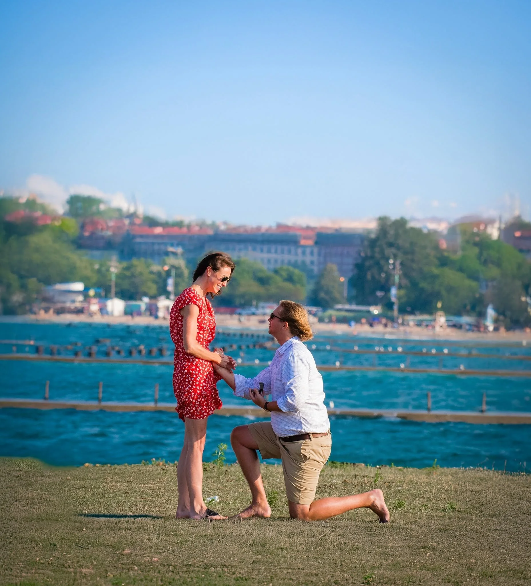 One knee, one question, and a lifetime of memories! 💍❤️ This romantic surprise marriage proposal at Fullerton Beach in Chicago's Lincoln Park captures the unforgettable moment when a beautiful lakeside afternoon becomes the beginning of a couple's n