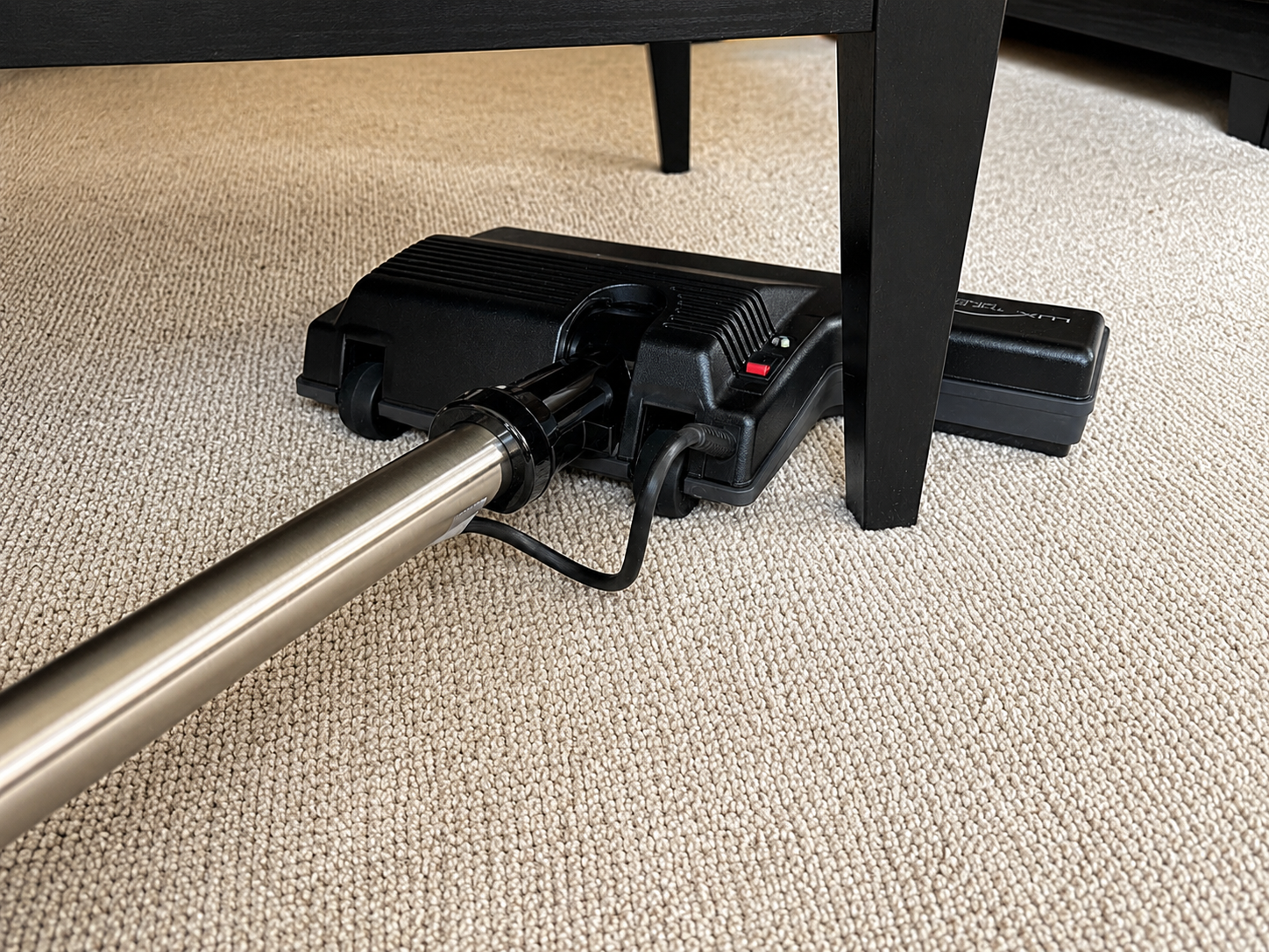 Aerus Power Nozzle Easily maneuvers around furniture legs and obstacles.