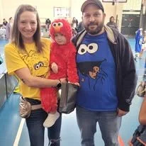 A family posing at Carrick Community Council's 2025 Halloween Party.