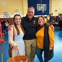 2 women and 1 man posing for a photo at Carrick Community Council's 2025 Halloween Party. 