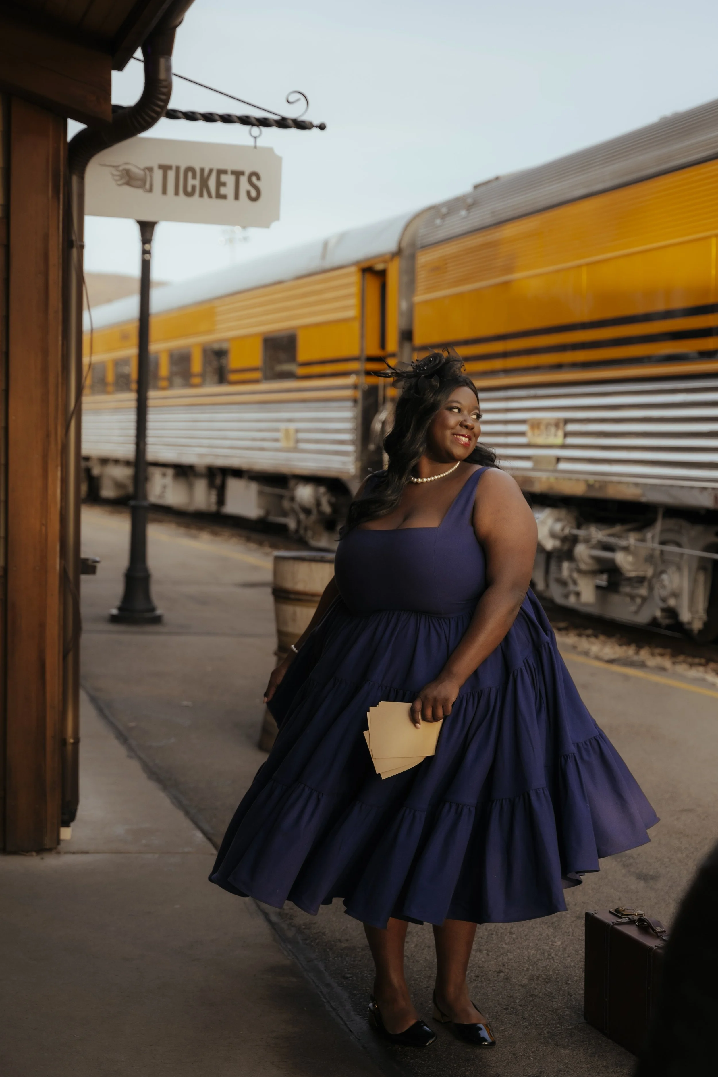 1920's themed fantasy photoshoot. Styled in 1920's wear at a train stop. Photoshoot styled and shot for Chelsea Reece Dresses