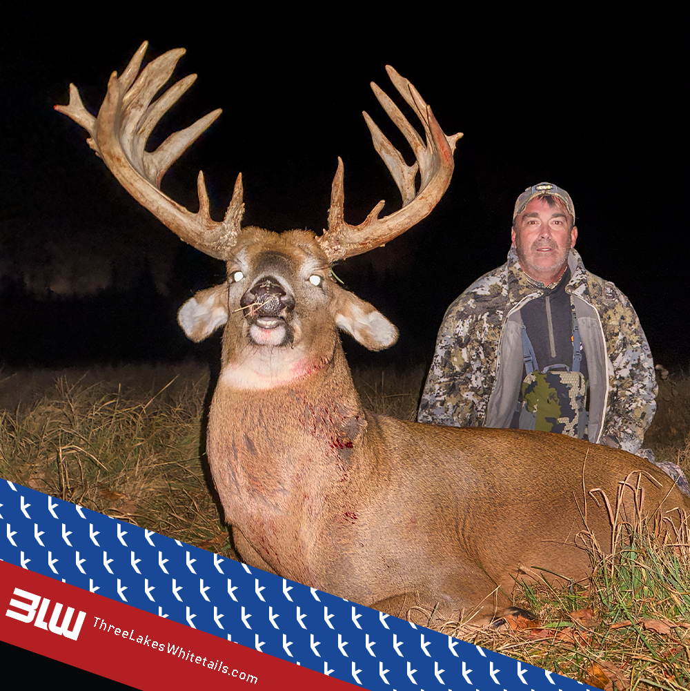 Steve at Three Lakes Whitetails using the Rack Jak Stand with a nice buck