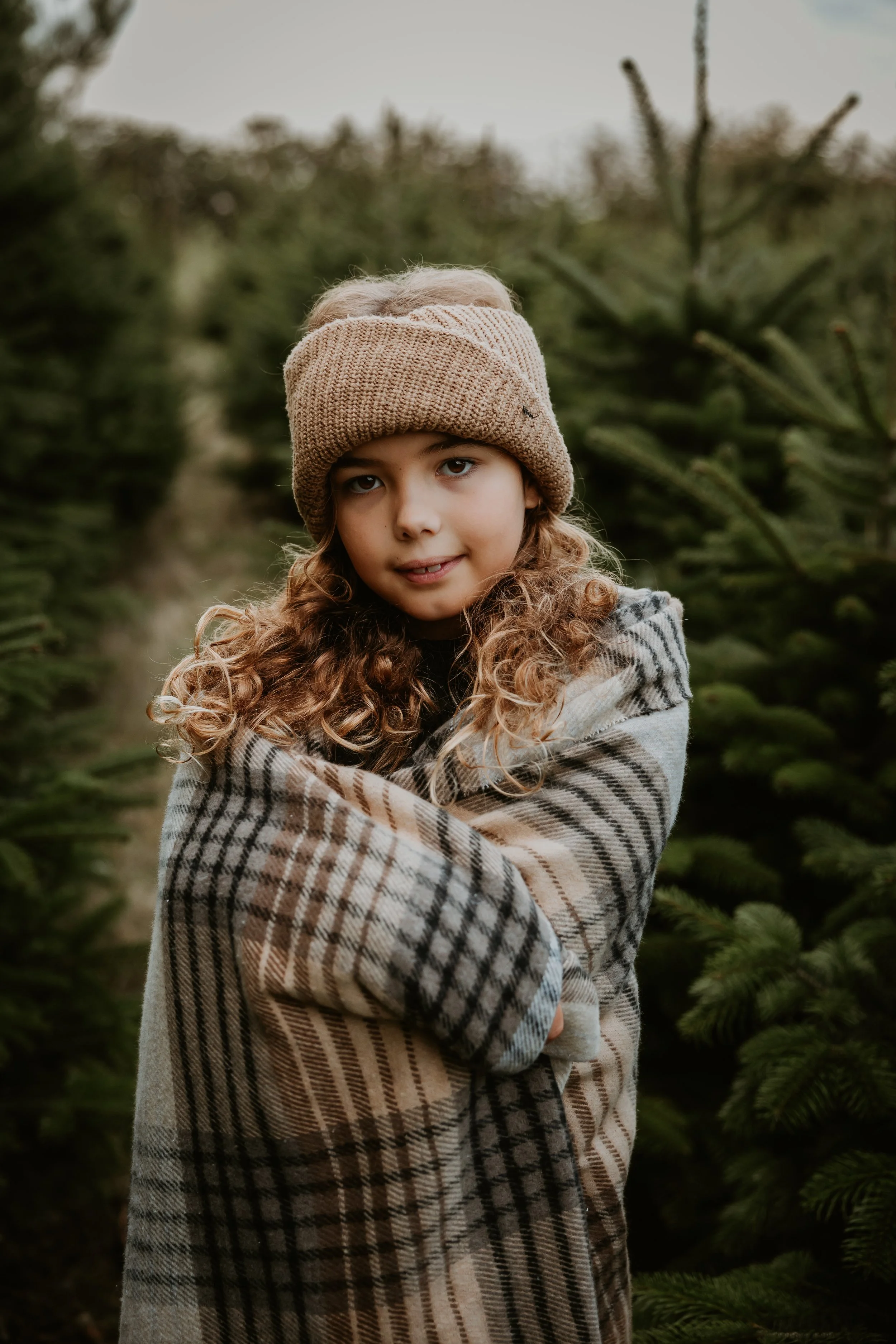 Hertfordshire Christmas photographer, Christmas mini sessions Hertfordshire, Hitchin Christmas photoshoot, family Christmas photoshoot Hertfordshire, Christmas tree farm photoshoot, studio Christmas mini sessions Hitchin, natural Christmas photograph