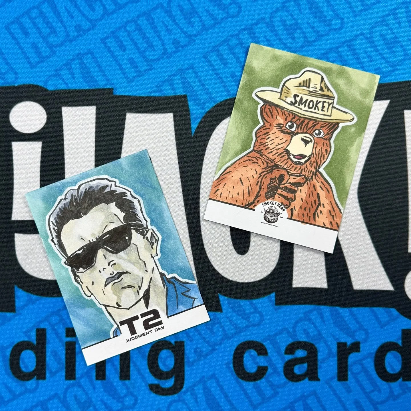 A couple new commissioned artist proof sketch cards from @saturdaymorningcards Terminator 2 and Smokey The Bear. 
.
.
.
@specialolympicsillinois #inclusion #downsyndrome #tradingcards #forthehobby #thehobby #whodoyoucollect #choosetoinclude #popeyesk