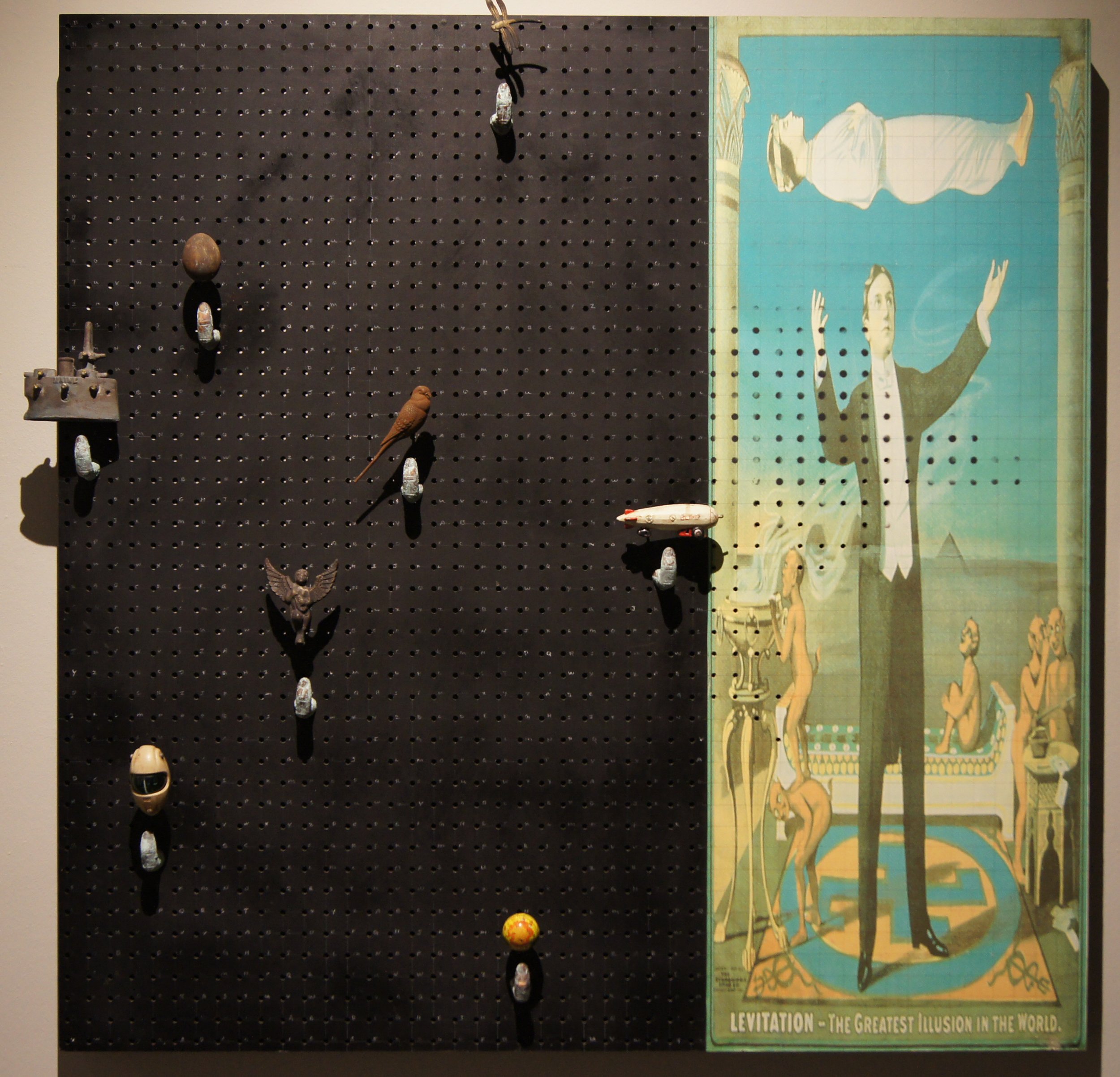 Norman Kary (American 1951) “Levitation”, 1999, collage with objects on board, gift of the artist, 2016 (48’’ H x 48’’ W) 