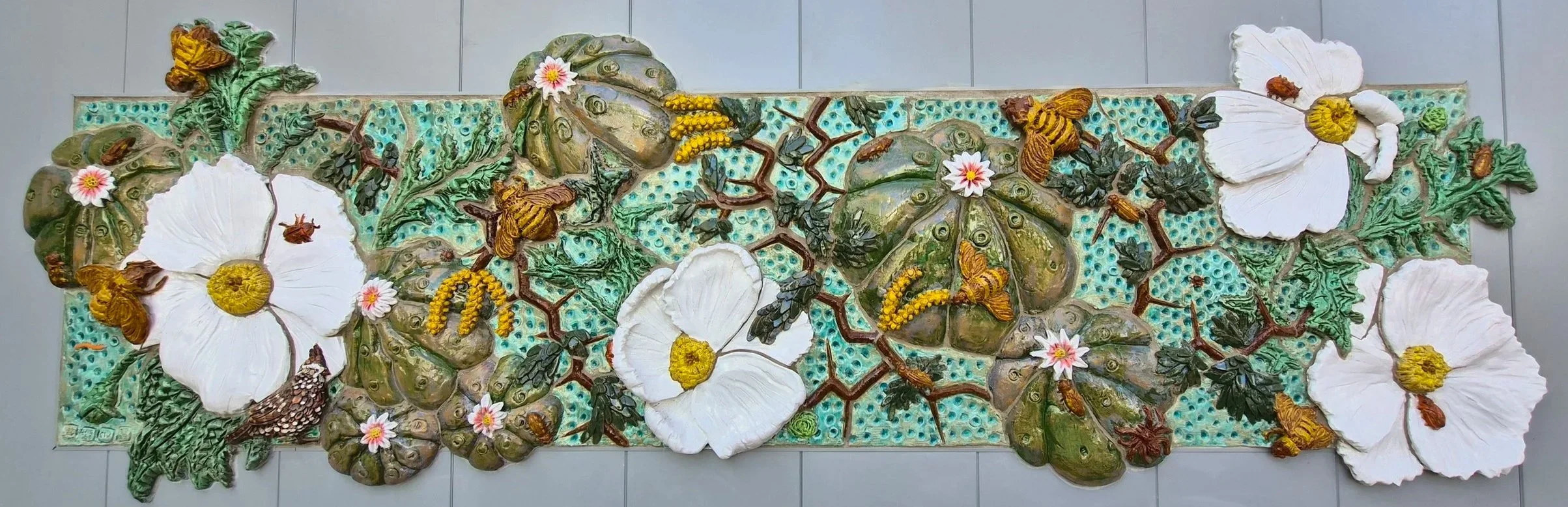 Diana Kersey (American 1971) “Resilience in Bloom”, 2025, earthenware with underglaze and alkaline glaze, gift of Ryan D. Patton and Daniel Zies, 2019 (36 ‘’ H x 144’’ W) 