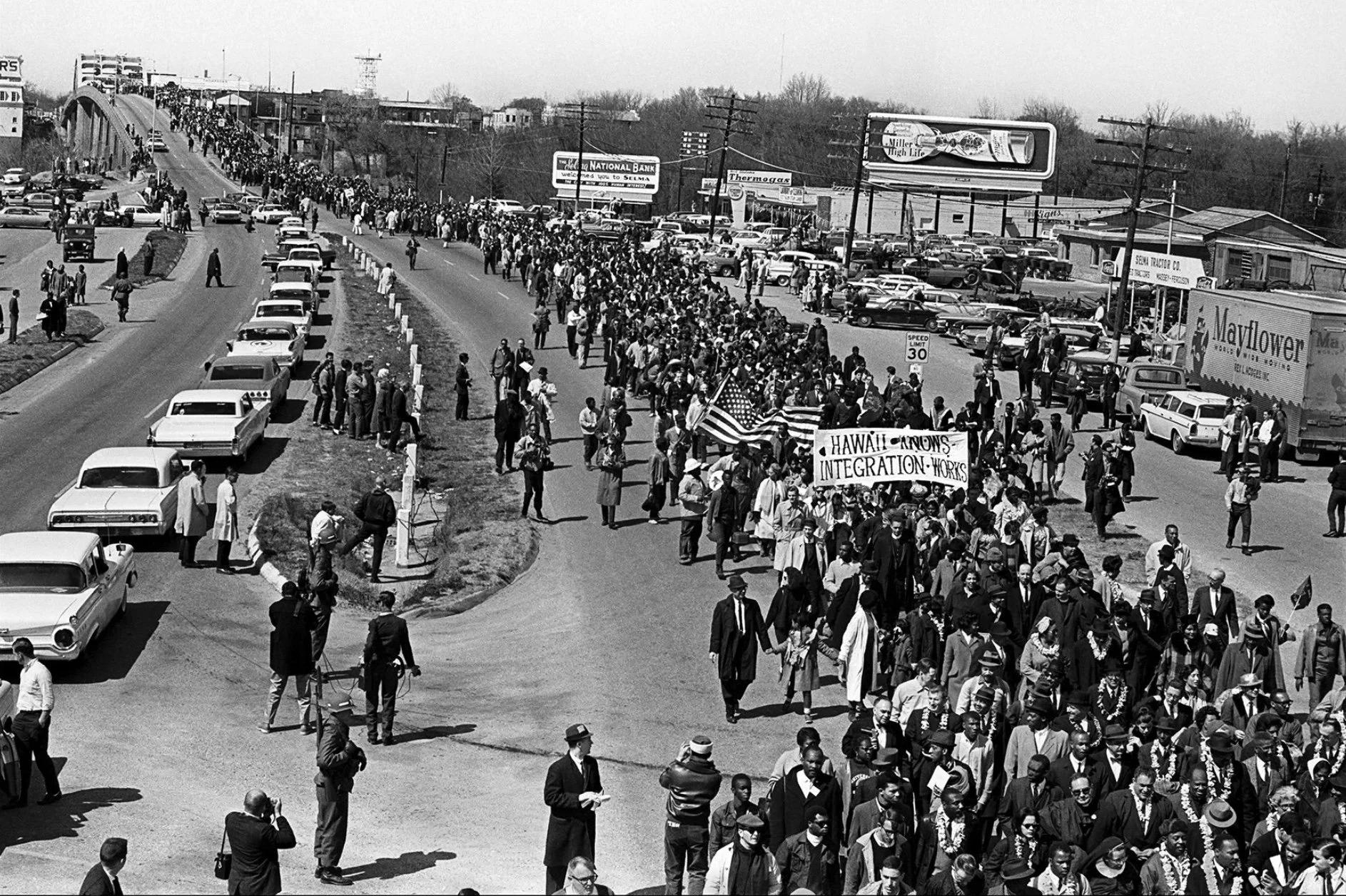 James “Spider” Martin (American 1931-2003) “Selma March and Edmund Pettus Bridge”, 1965, edition 2 of 3, archival digital print on exhibition fiber paper, gift of Doug McCraw, 2024 (24’’ H x 35 ½’’ W) 
