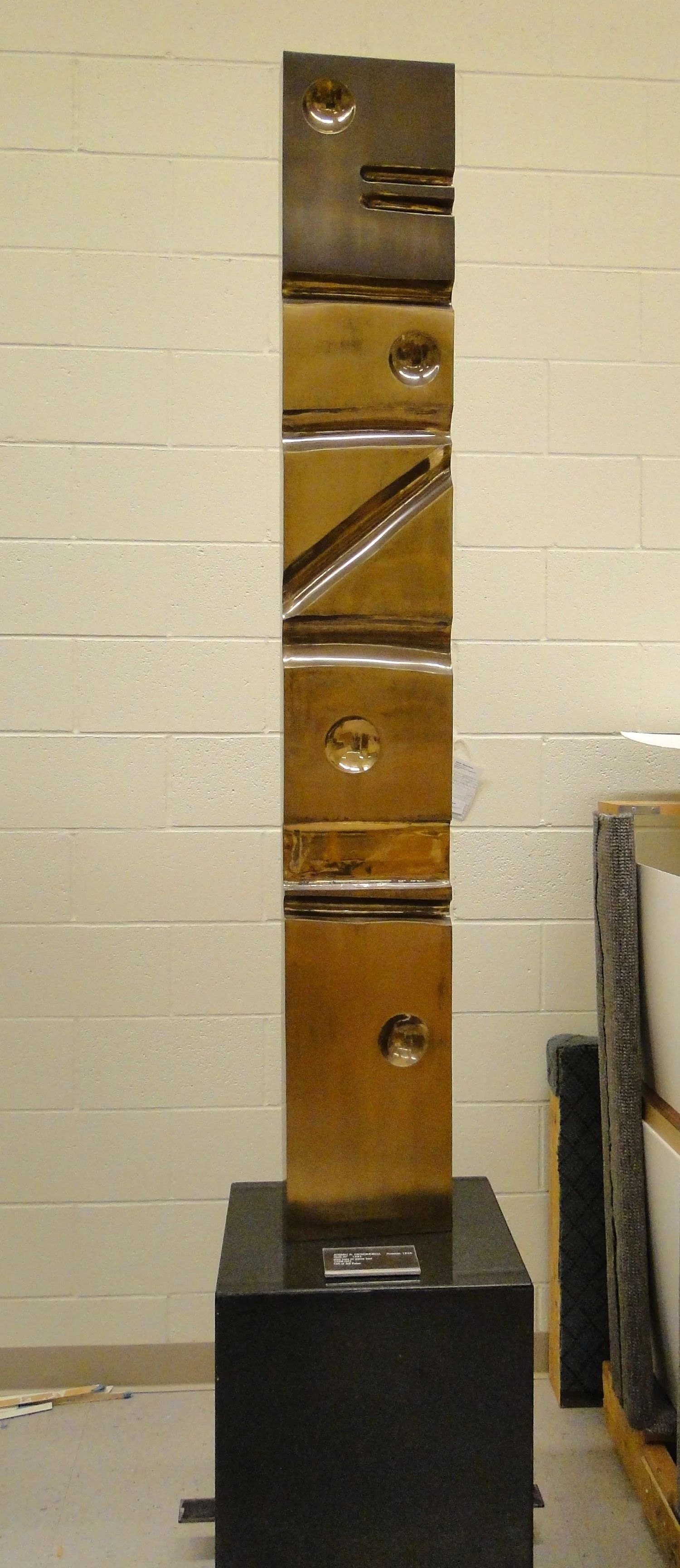 Joseph McDonnell (American 1936) “Stella IV”, 1983, brass, stone, gift of Jeff Parker, 1998 (6’ H x 10 ½’’ W x 3 ¼’’ D) 