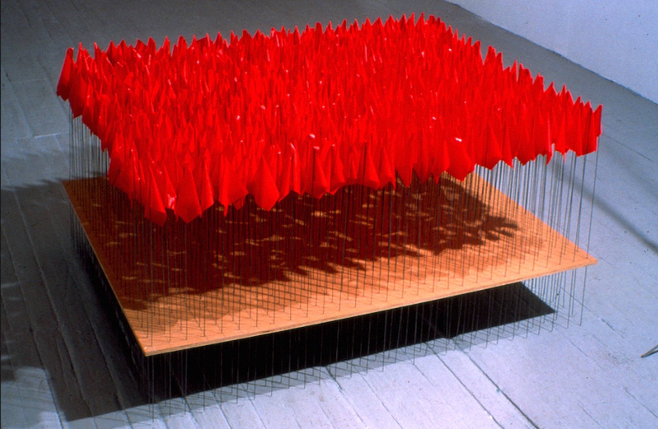 Joe Smith (American 1952) “Crop”, 1998, plywood and marker flags, gift of the Museum of Fine Art, Houston, the Broida Collection and Museum of the Southwest, 2013 (48" L x 48" D x 30" D) 
