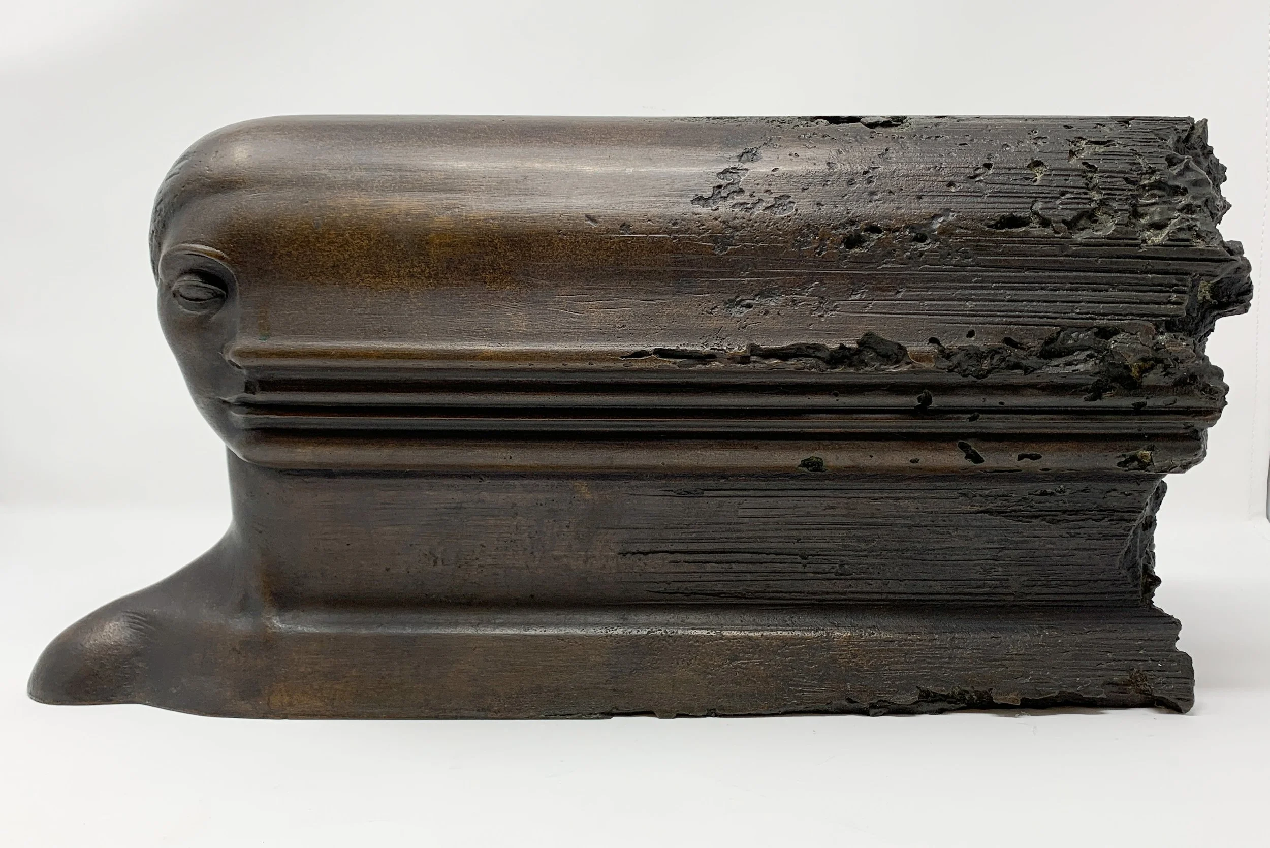 Josep Maria Subirachs (Spanish 1927-2014) “Bust”, 1980, edition 7 of 9, bronze, gift of Jeff Parker, 1998 (8’’ H x 17’’ W x 4 1/2’’ D)