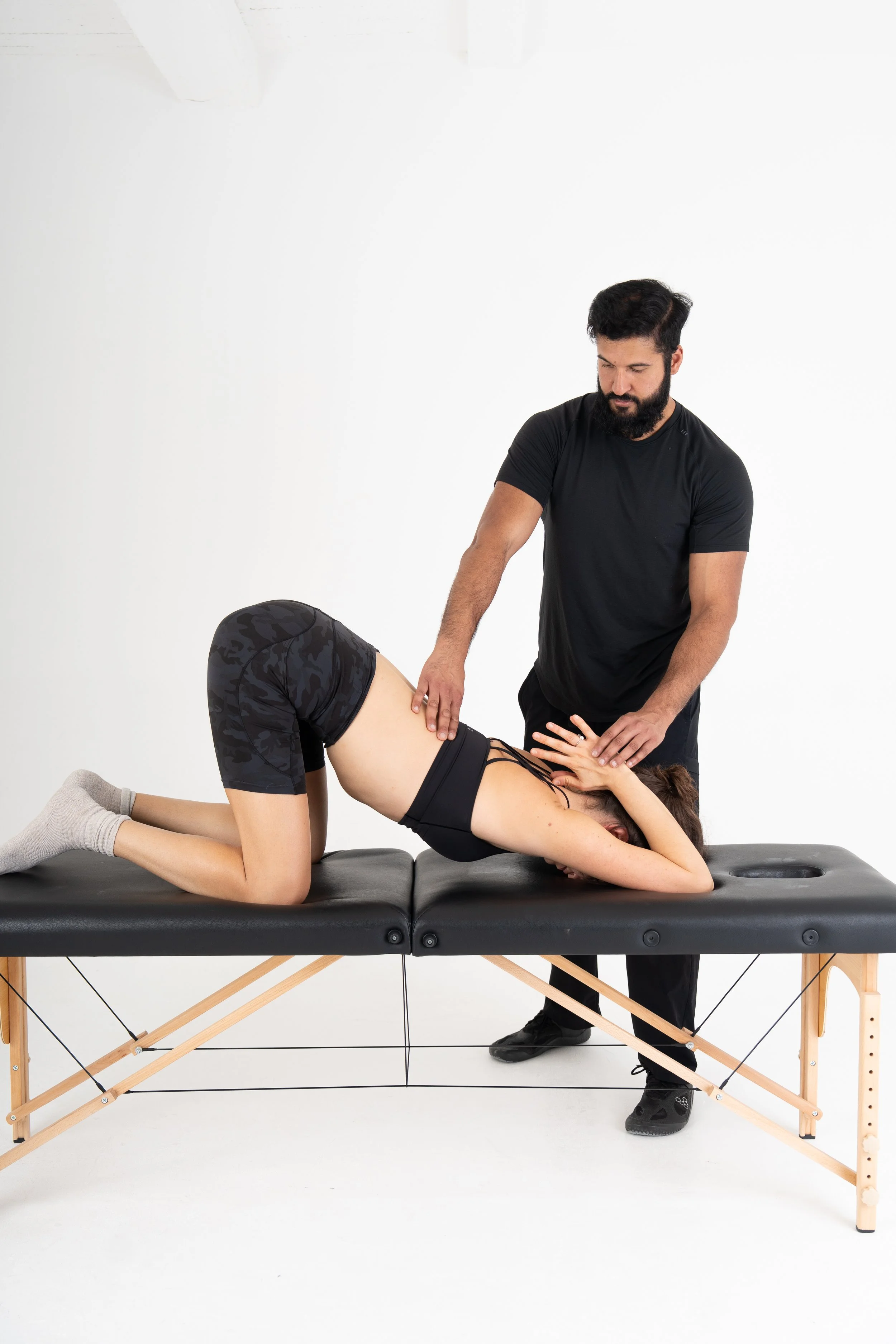 A personal trainer performing assisted stretching at Dr Stretch in Islington