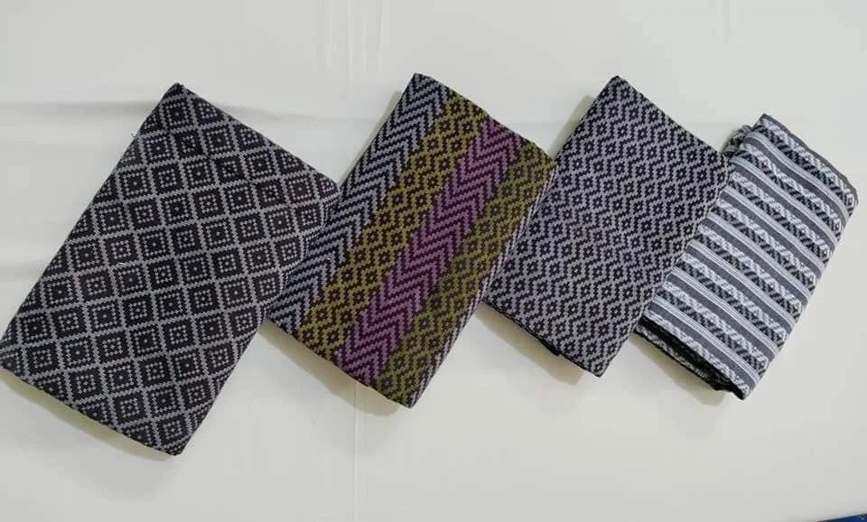 Myanmar. Women longyi designs. Photo Credit: Nan Shae Thu. People weave 5 to 8 yards of the same Longyi design during the processing. The length of a Longyi is 2 yards, and it takes a day to complete the process. This is not easy, and it requires the