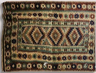 Bulgaria. Chiprovtsi flat weave carpet. Bakam Pattern.  Chiprovtski weaving is classified as UNESCO intangible heritage. Dimensions unknown. Wool. Used with permission @Elisa Rugs. Accessed via https://elisarugs.com/rug-making-history