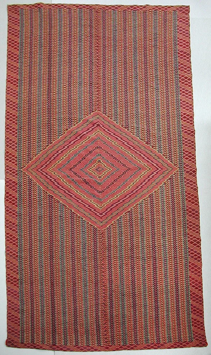 Mexico. Coahuila, Saltillo. Serape of Wool & cotton. Dimensions: 240cm x 131cm. 1800-1850. Gift of Sally Hart Sheehy, 2002. Long associated with use by horsemen—which accounts for their considerable size—they took on nationalist overtones after Mexic