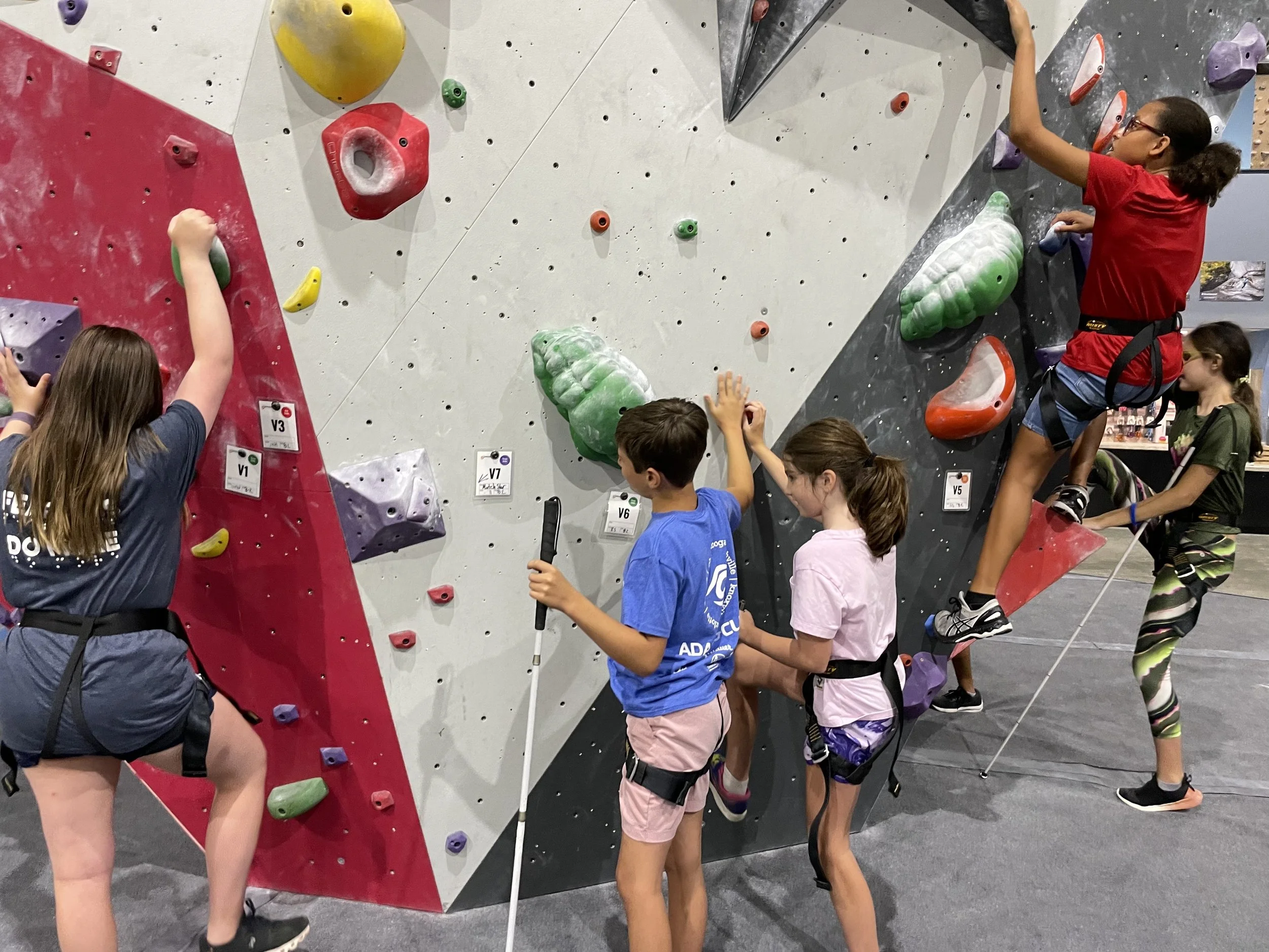 Bravo campers tackle a climbing wall