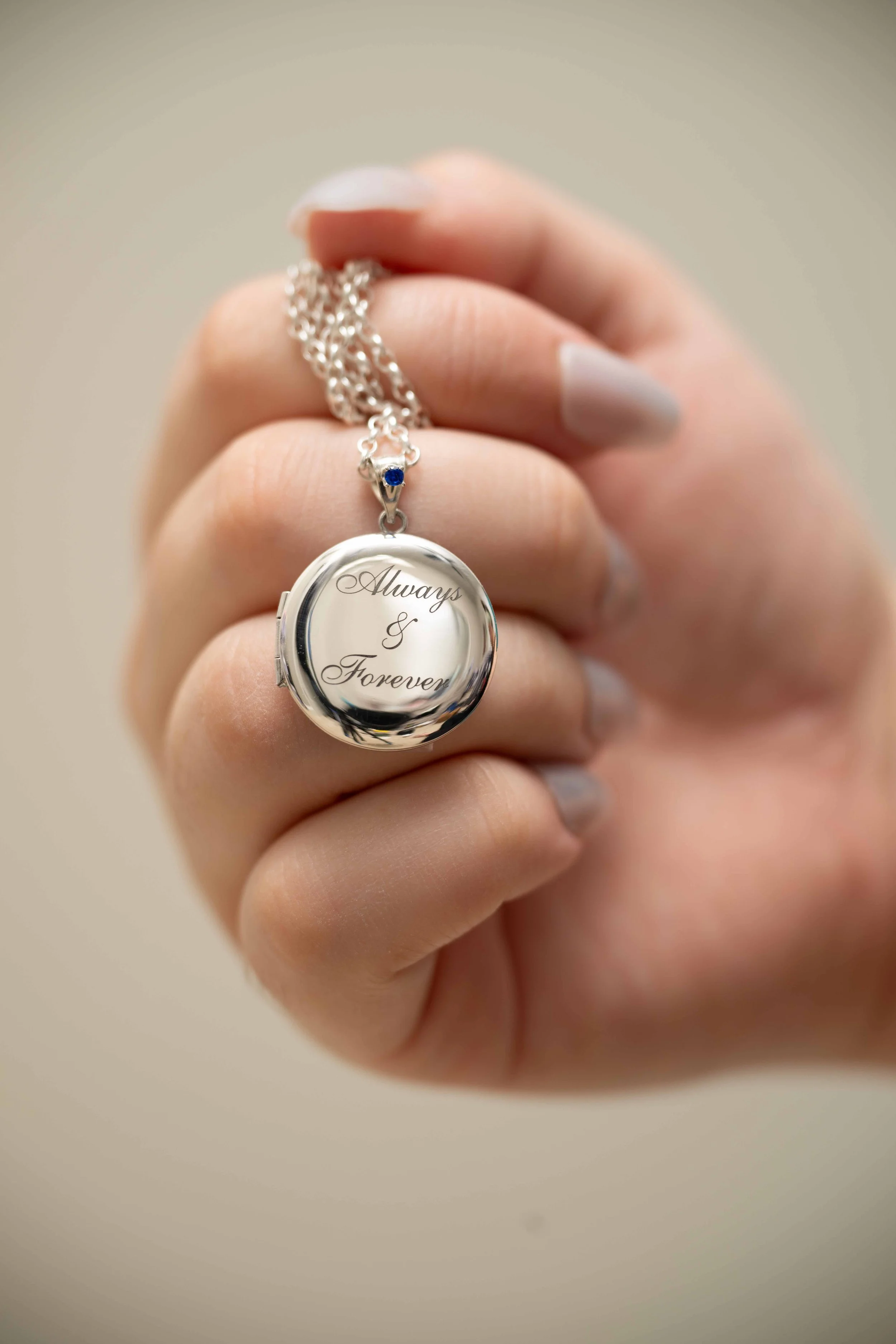 Holding my always and forever locket