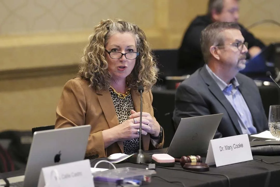 Woman at board meeting