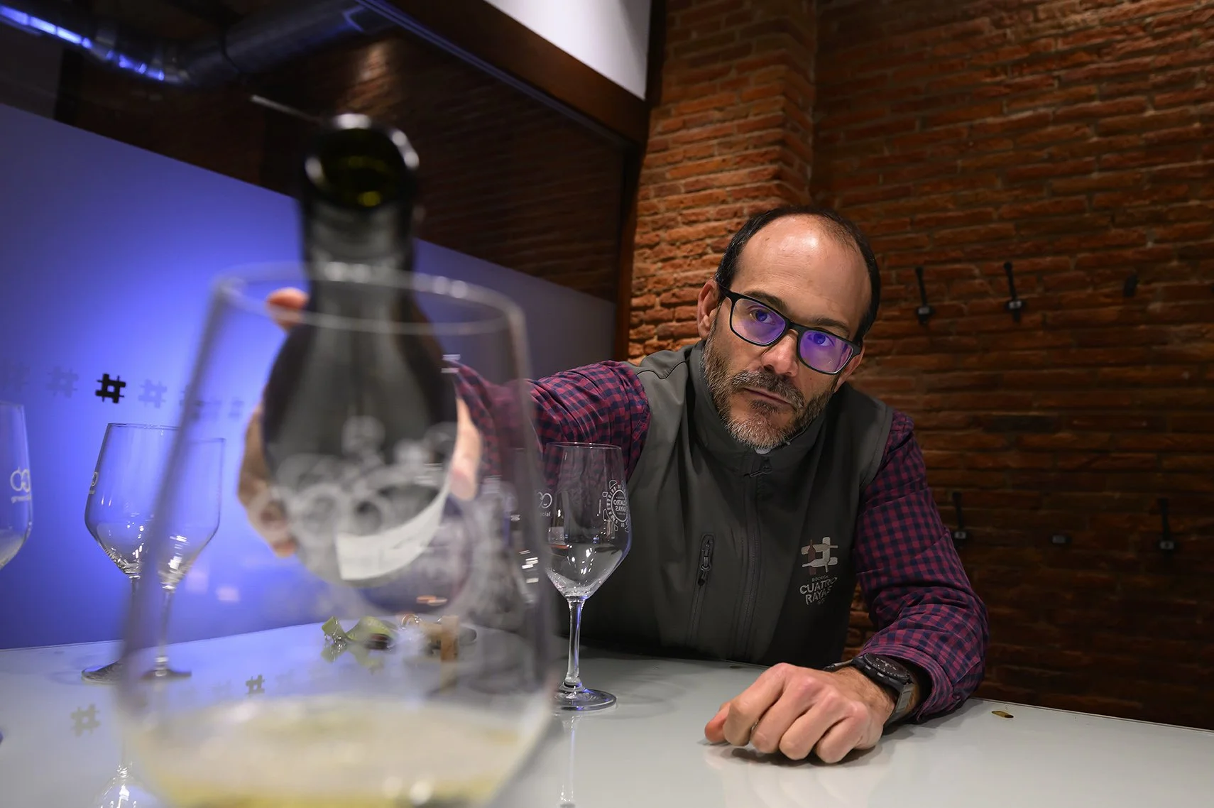 Oenologist Roberto Tello pours a glass of wine at the Cuatro Rayas bodega in La Seca, Valladolid. Photograph: Denis Doyle/The Guardian