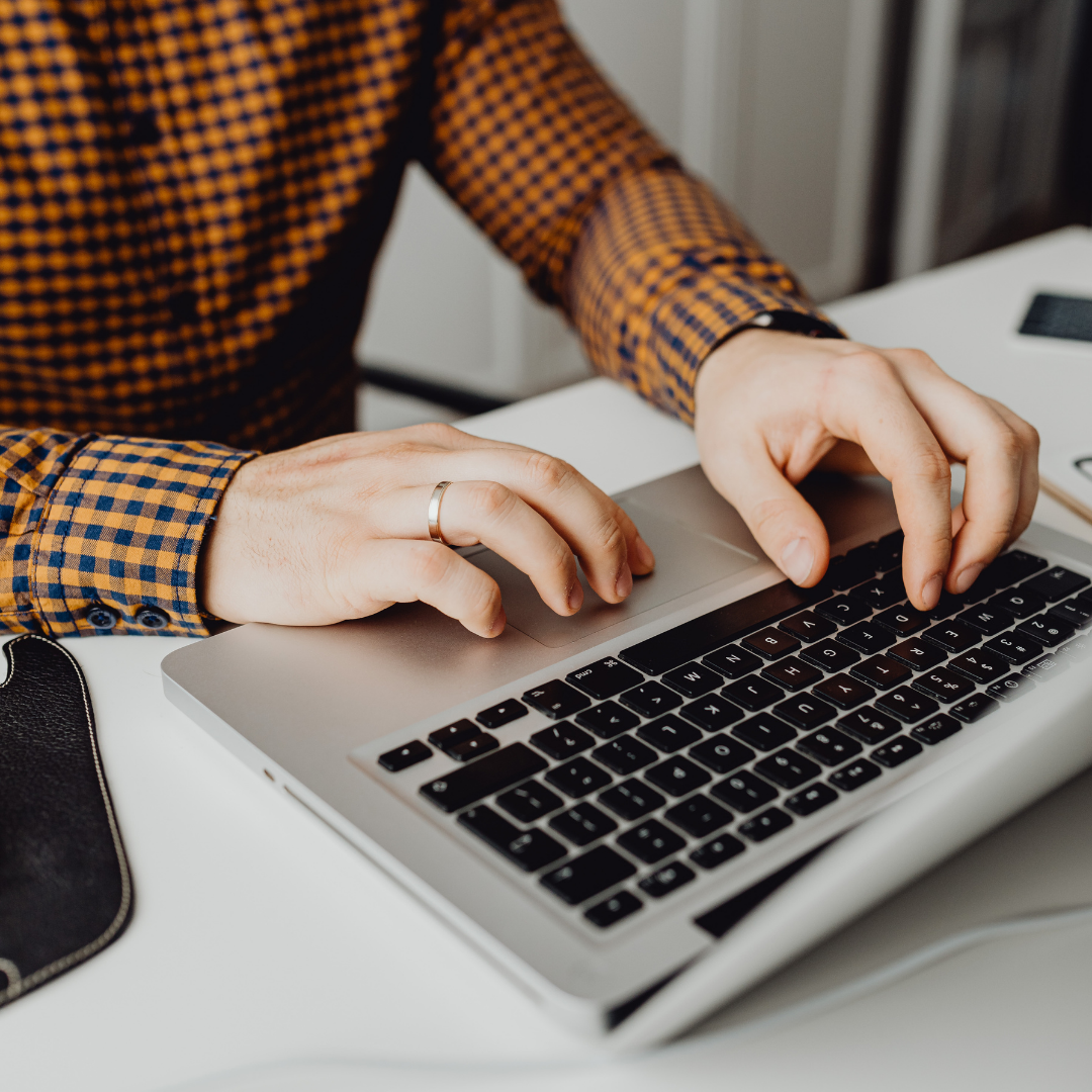 Worker using GoodCRM system on laptop with integrations