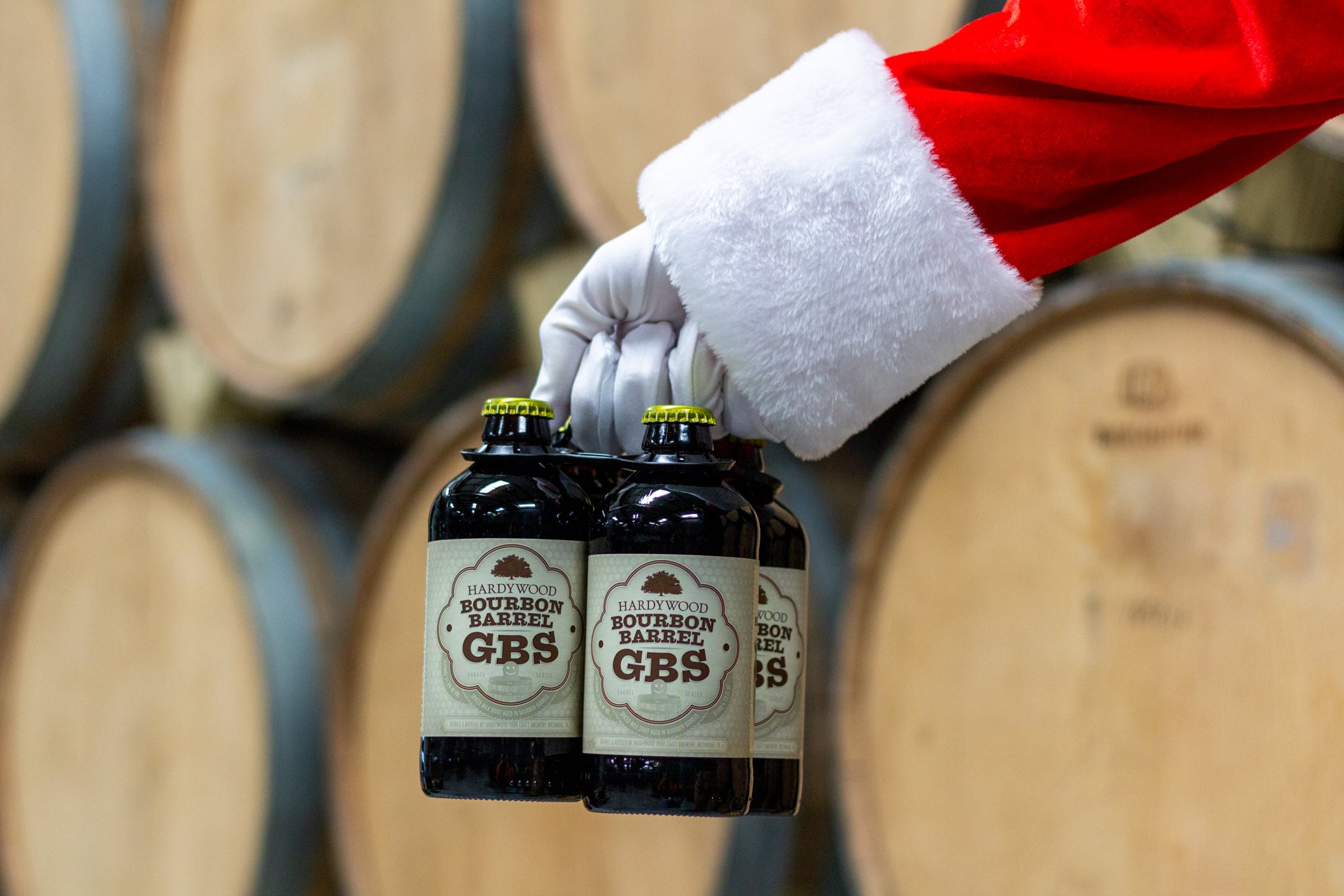 Santa holding Hardywood Bourbon Barrel GBS 4 pack 12oz bottles