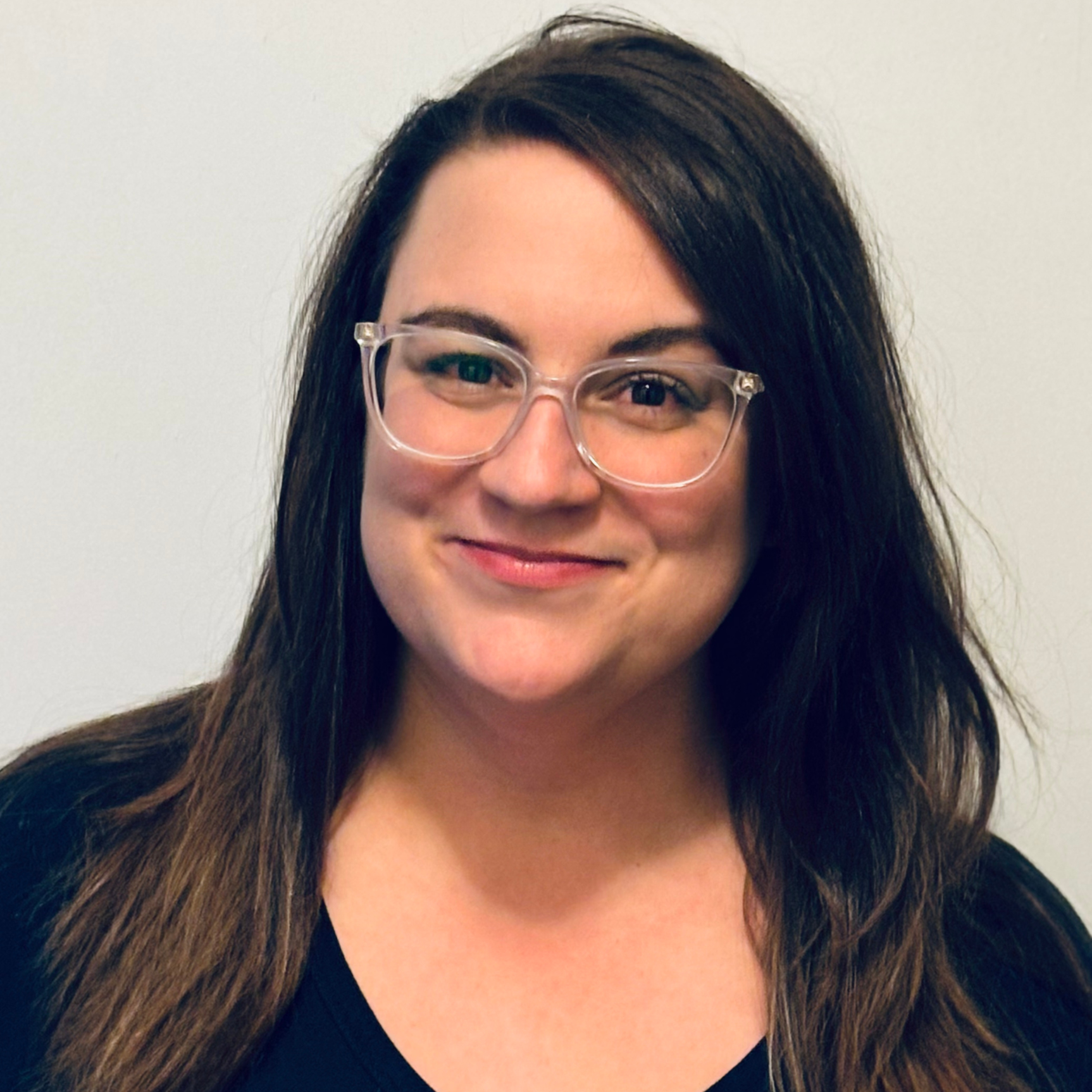 Dawn Buratynski, a therapist, smiling warmly, representing guidance and encouragement offered in setting boundaries with family in Bay Shore, NY.