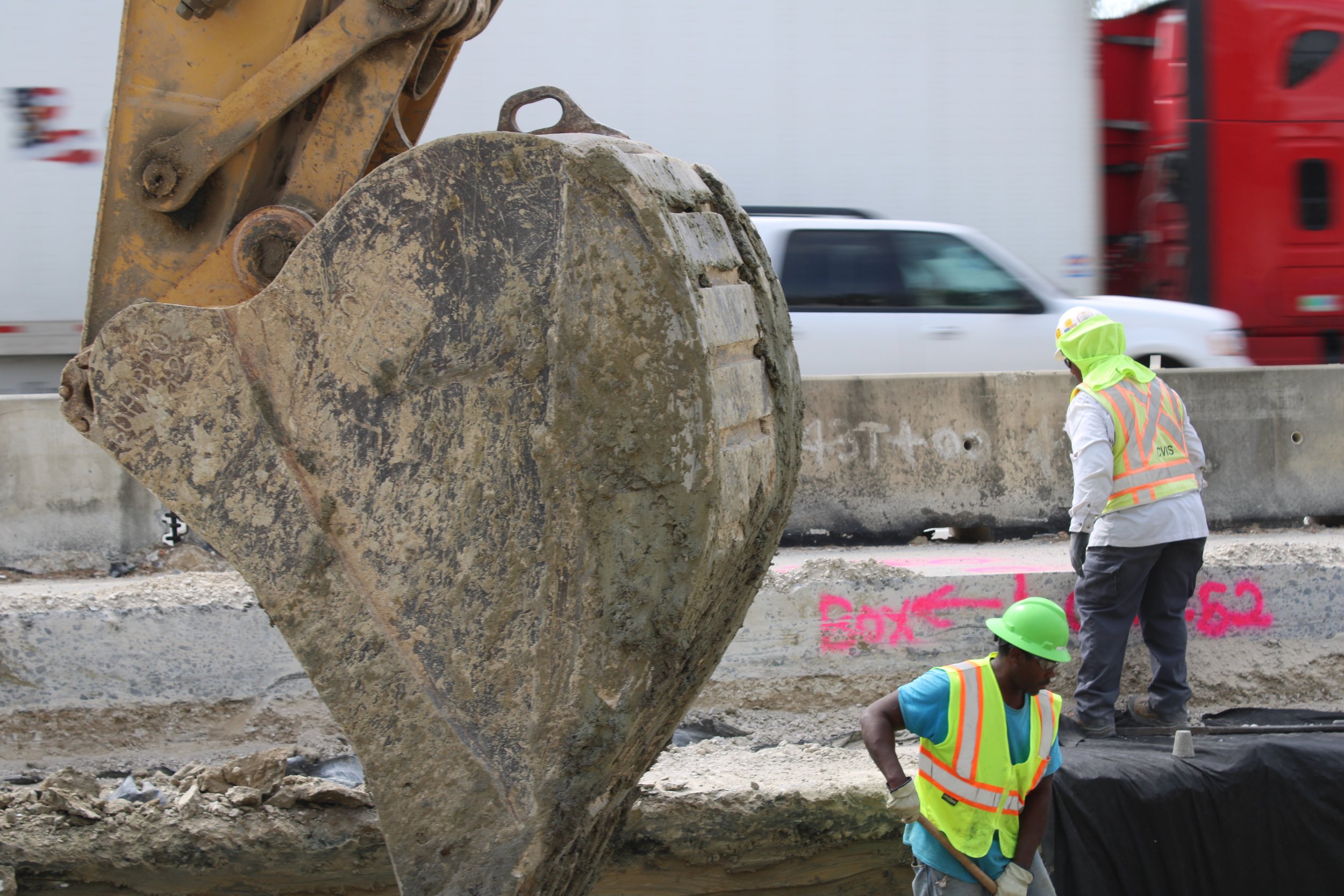 Crew members work alongside traffic on Interstate 10 near College Drive. March 2023.