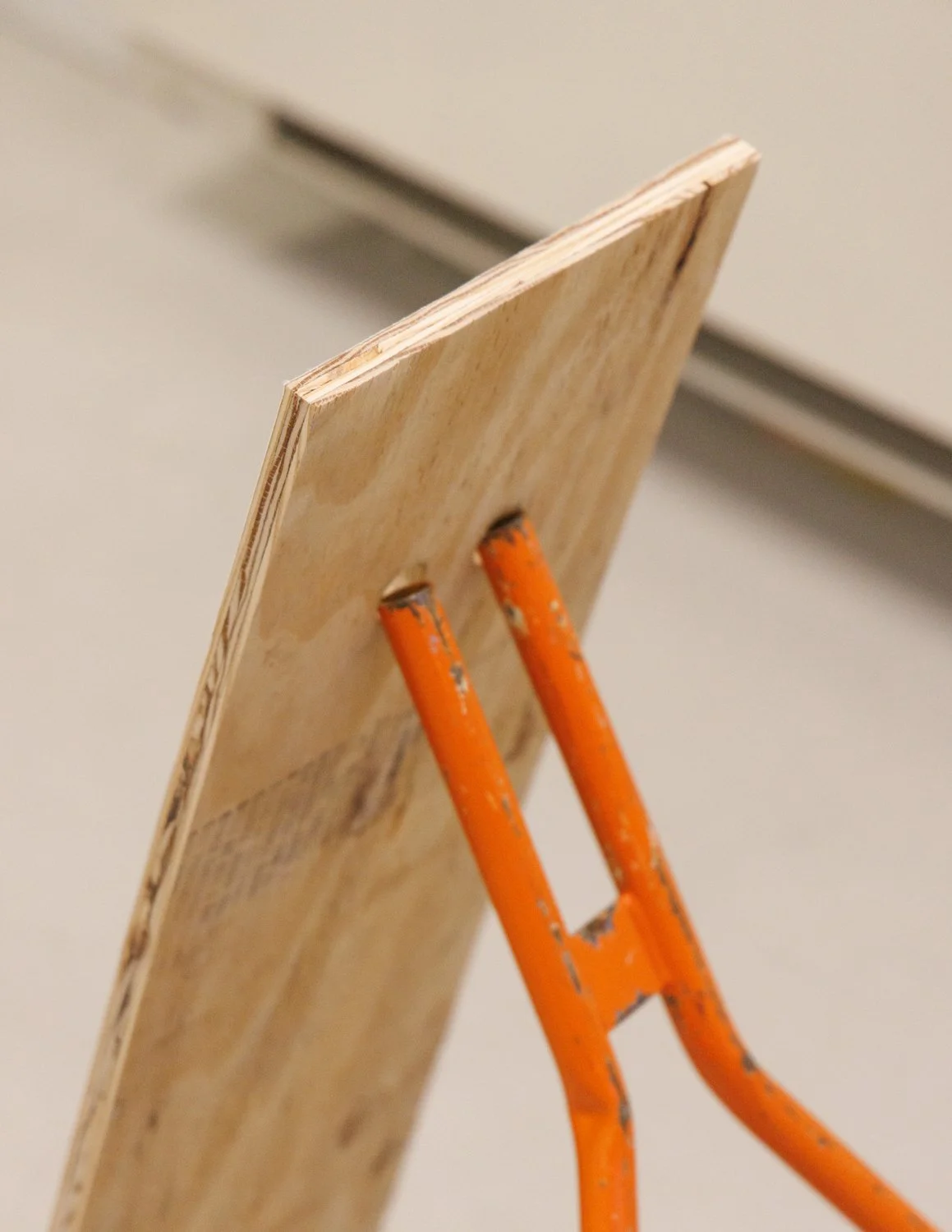 Untitled (2025) (detail shot)  Wood, phototex print, metal a-frame support leg