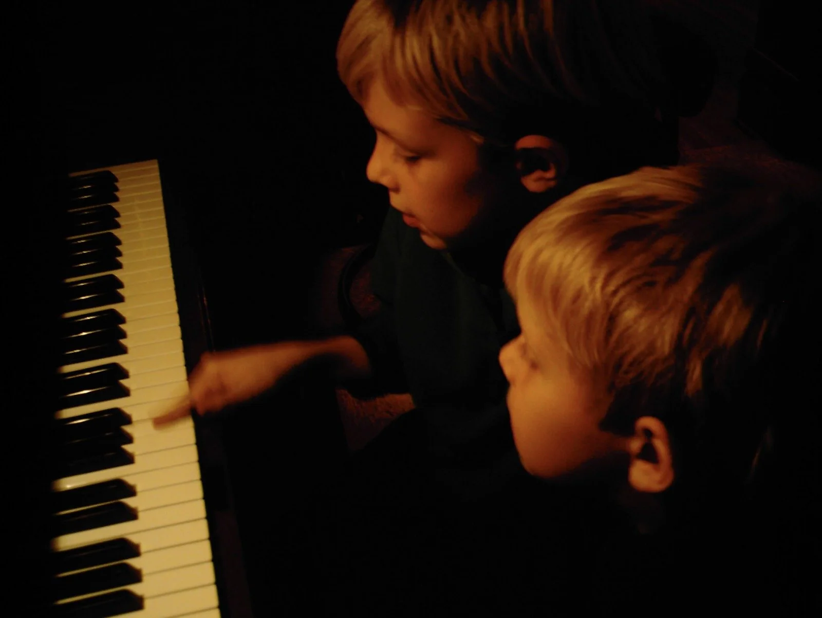 Sam Debatin as a child playing piano