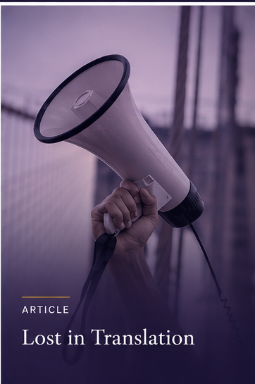 A person holding a white megaphone with a black handle and rim, with purple lighting and a blurred cityscape background, along with the text 'Lost in Translation' and 'ARTICLE' at the bottom.