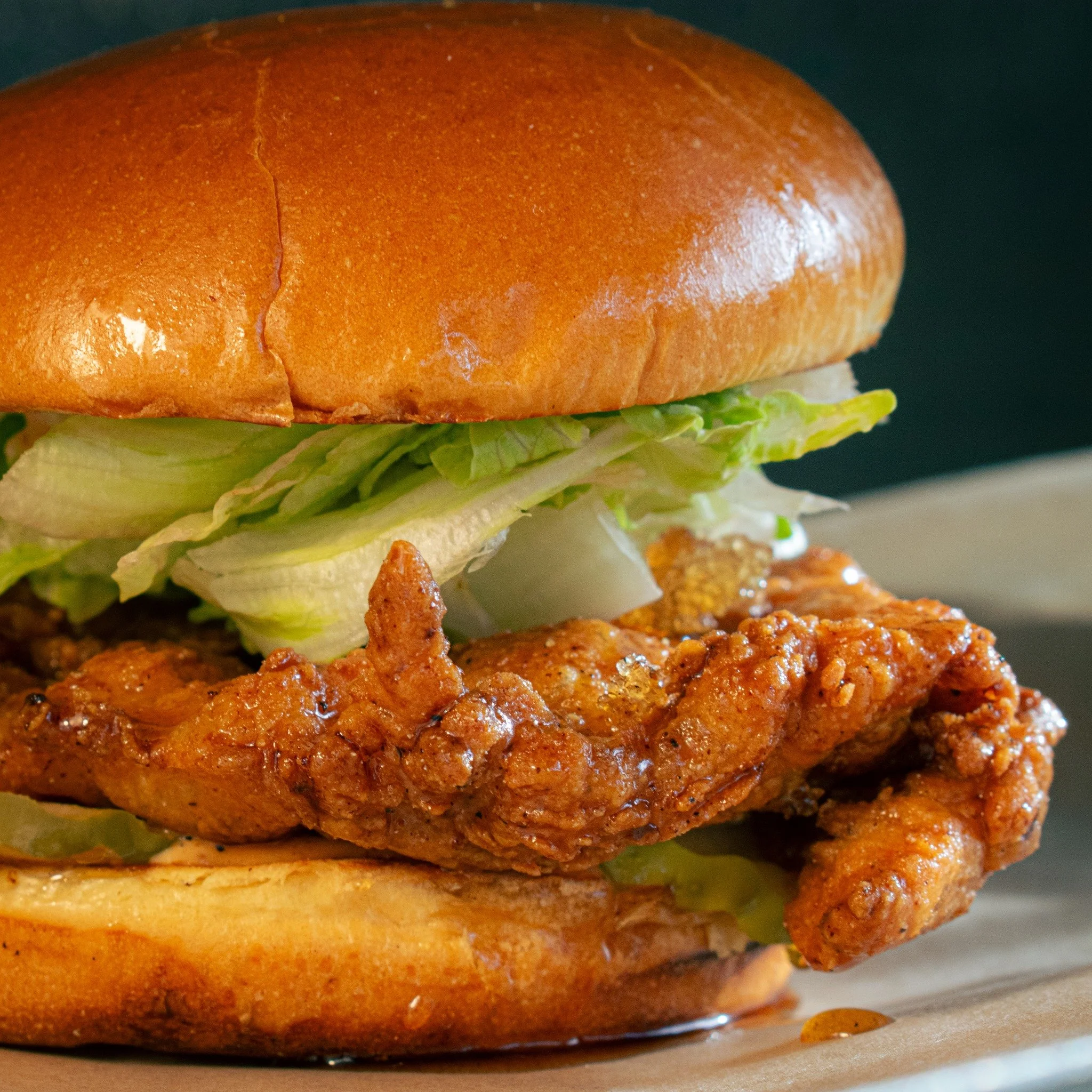 🍯🐔 The fan favorite returns to kick off spring! While we wait for Superhero Month to take flight on April 15, we&rsquo;re bringing back the Hot Honey Chicken Sandwich! Crispy fried chicken thigh dripping with hot honey stacked up on fresh buttery b