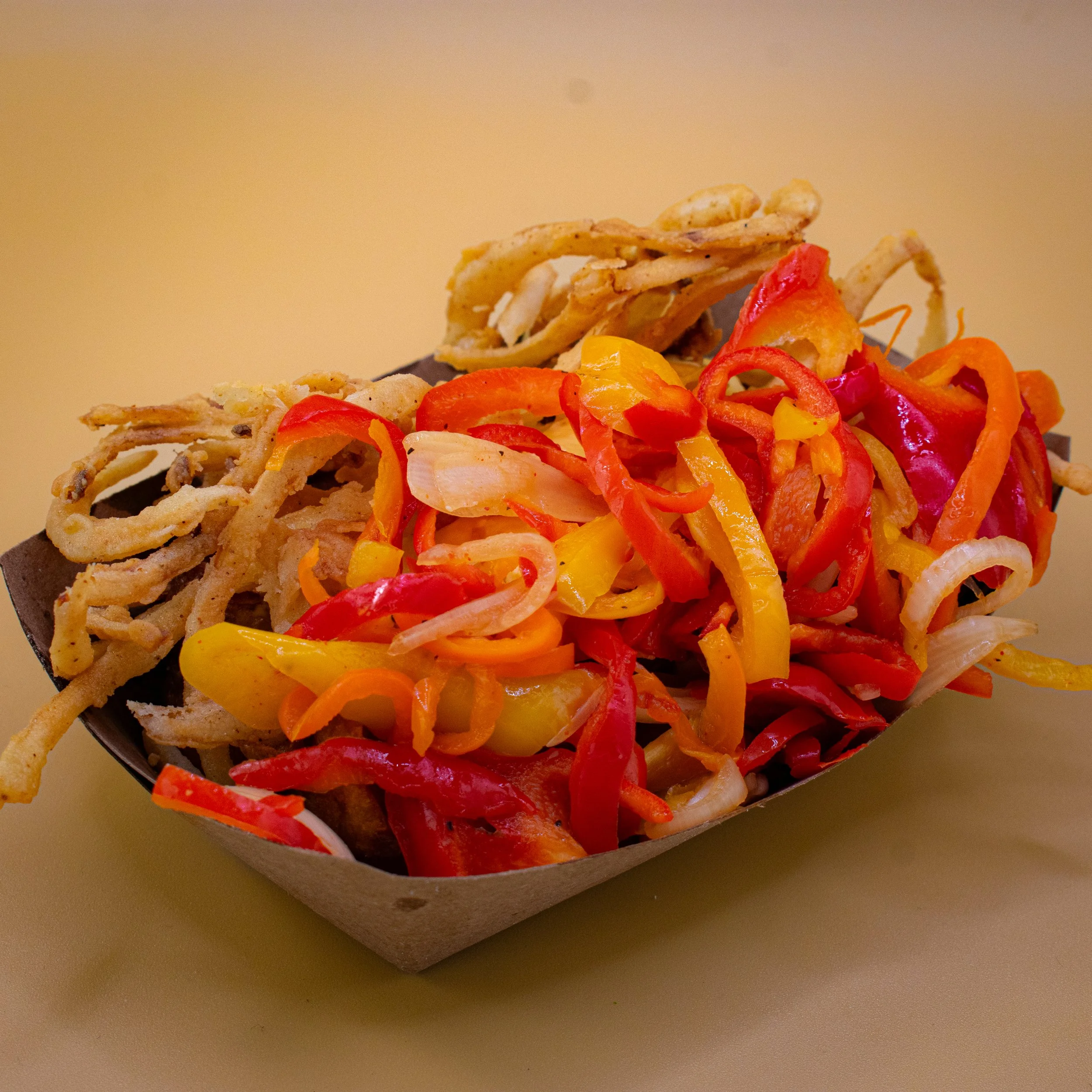 Fiamma Burger Queso Mojo Potatoes with pickled peppers and crispy onions