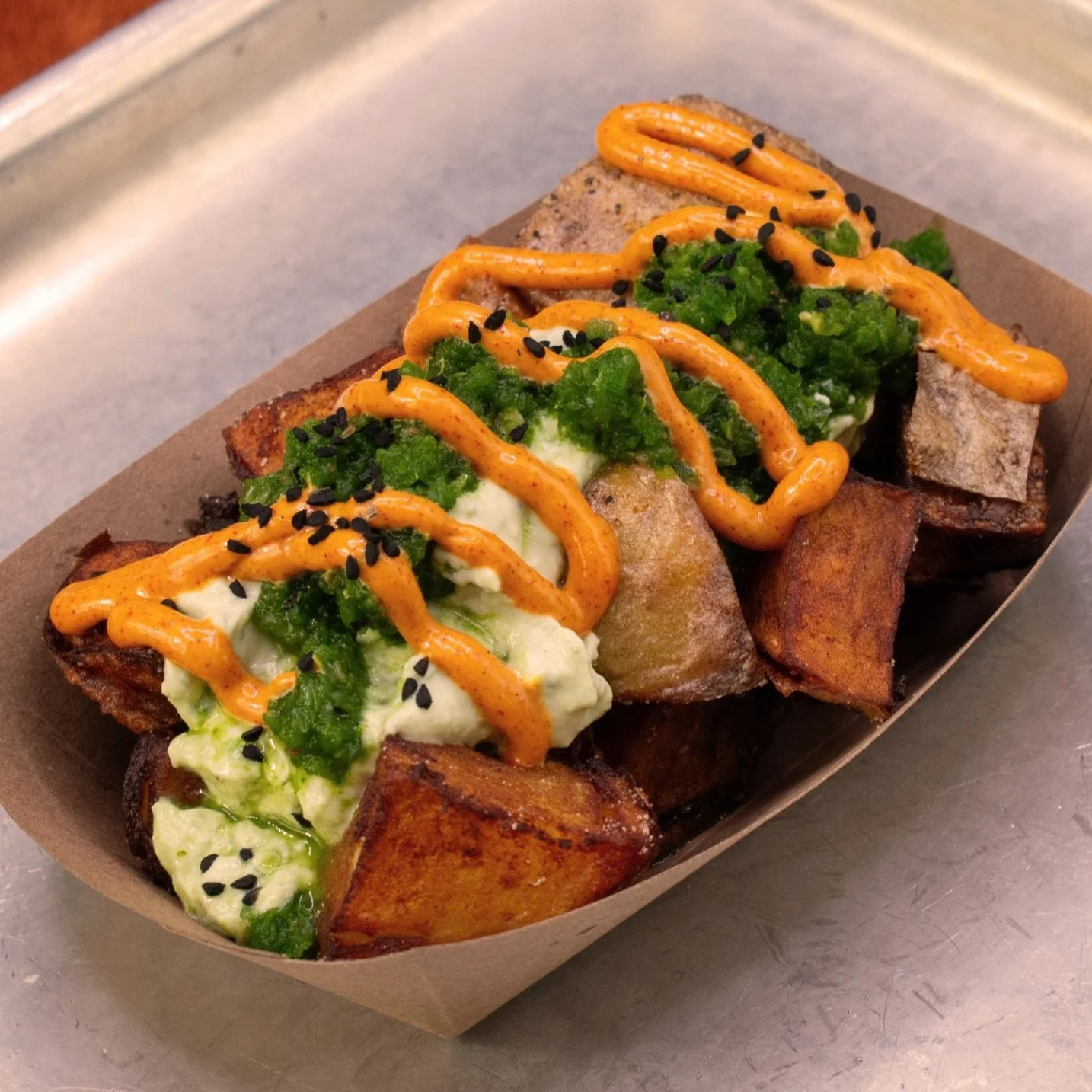 Fiamma Burger and Ambo Ethiopian Collaboration Potato Mojos with Burebure and KochKocha sauce