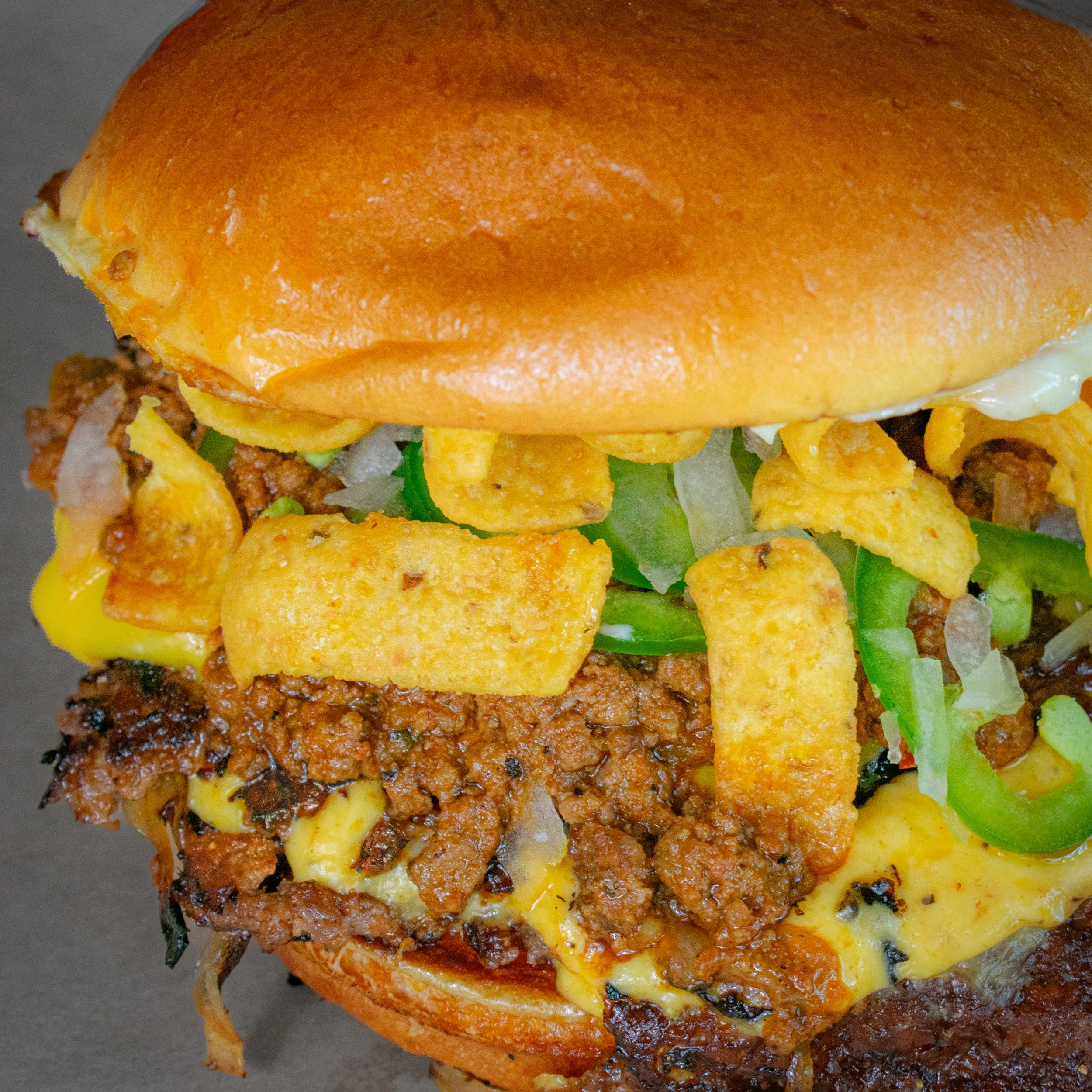 Fiamma Frito Pie Smash with Fritos, Chili Con Carne  & pickled Jalapeno