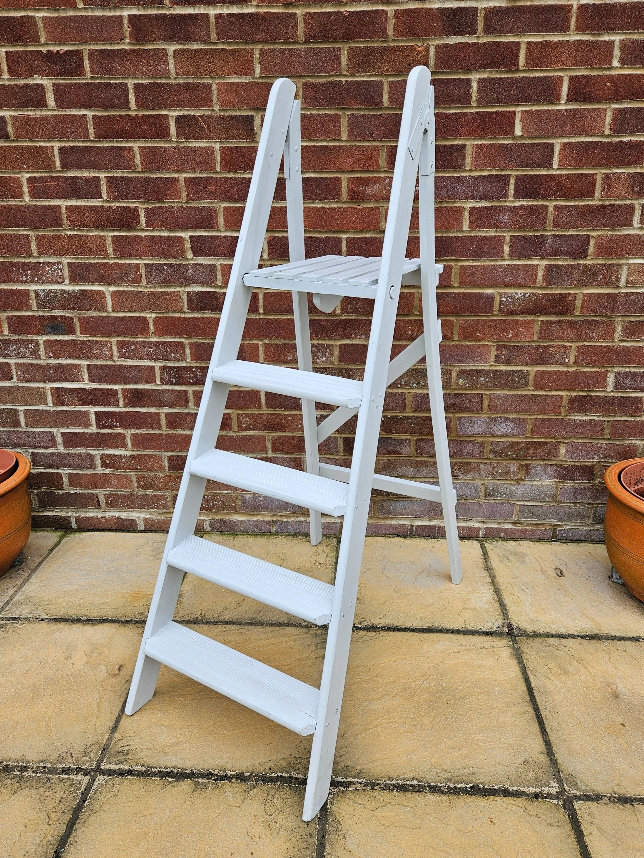 Tall wooden ladder for hire from Mae & Maple Prop Hire