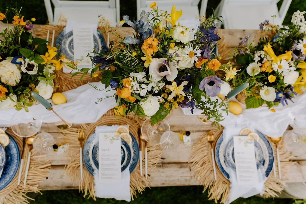 Overhead view of an outside wedding breakfast table set up - Mae & Maple Prop & Decor Hire