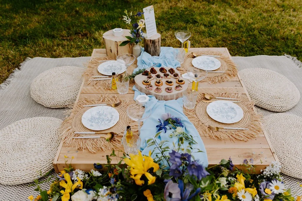 Picnic for four people on a handmade pallet table hired from Mae & Maple Prop & Decor Hire