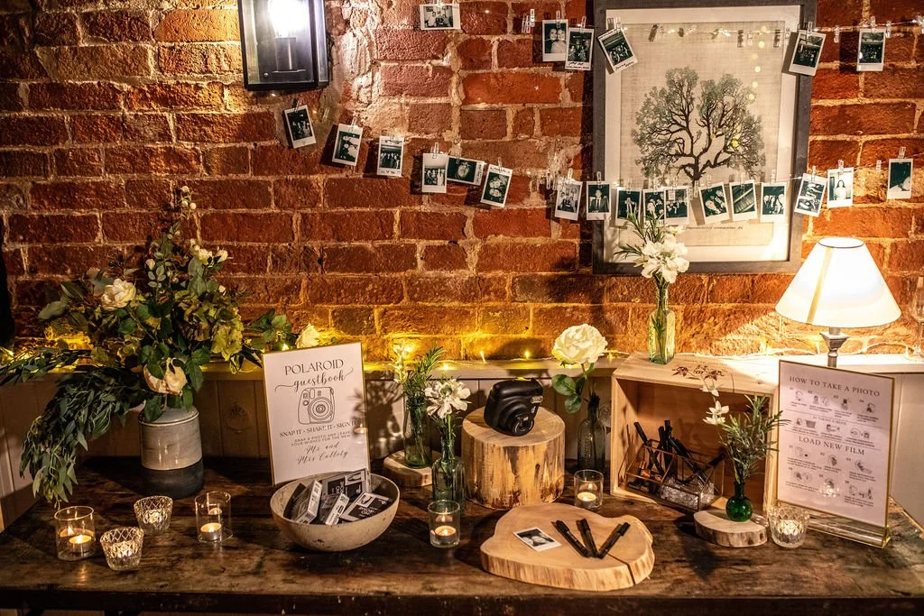 Poloroid Photo Display at a wedding at Sopley Mill supplied by Mae & Maple Prop & decor Hire
