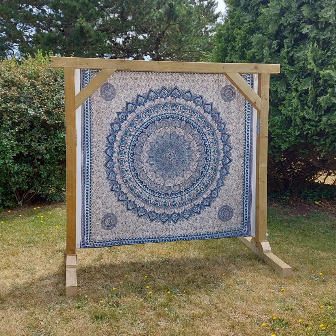 Blue boho print backdrop on wooden ceremony arch - hire for Mae & Maple