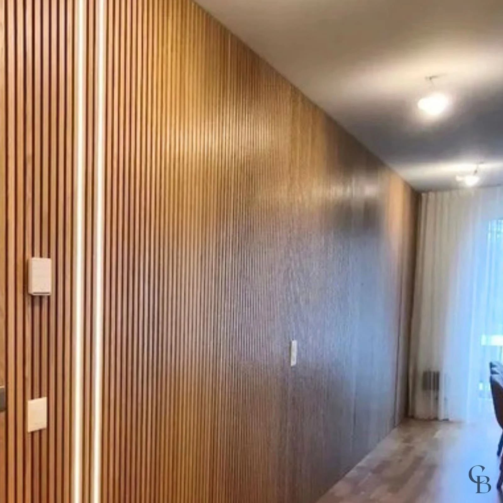 Habillage mural en lames de bois sur mesure à Genève