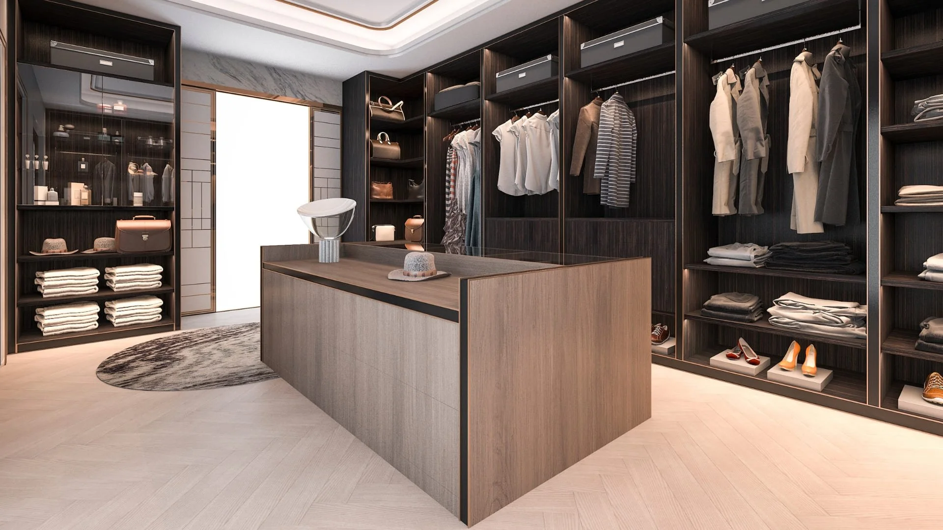Dressing sur mesure haut de gamme avec îlot central, rangements ouverts et finitions en bois réalisé par Concept & Bois à Genève.