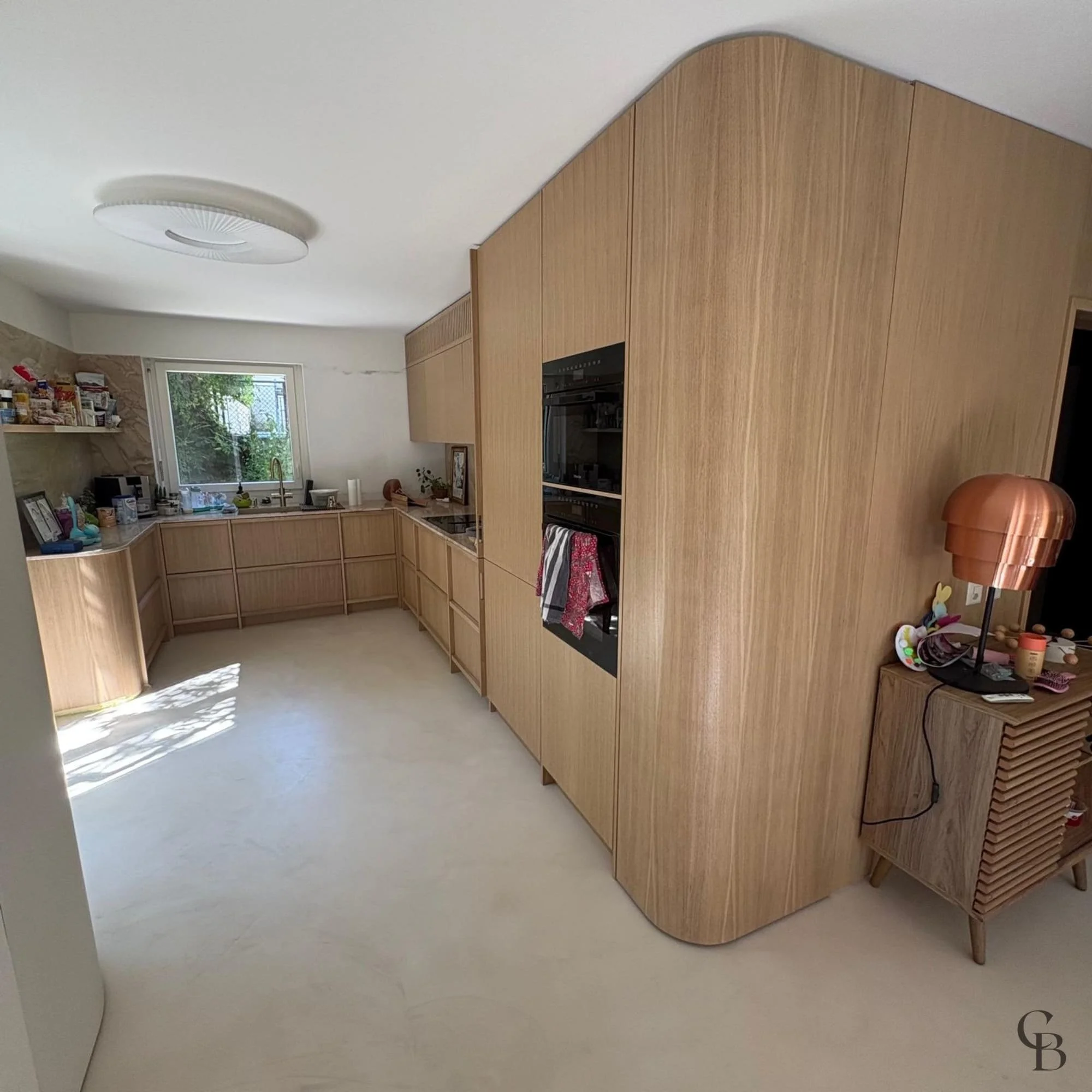 Projet complet de cuisine sur mesure avec mobilier intégré et finitions premium réalisé à Nyon.