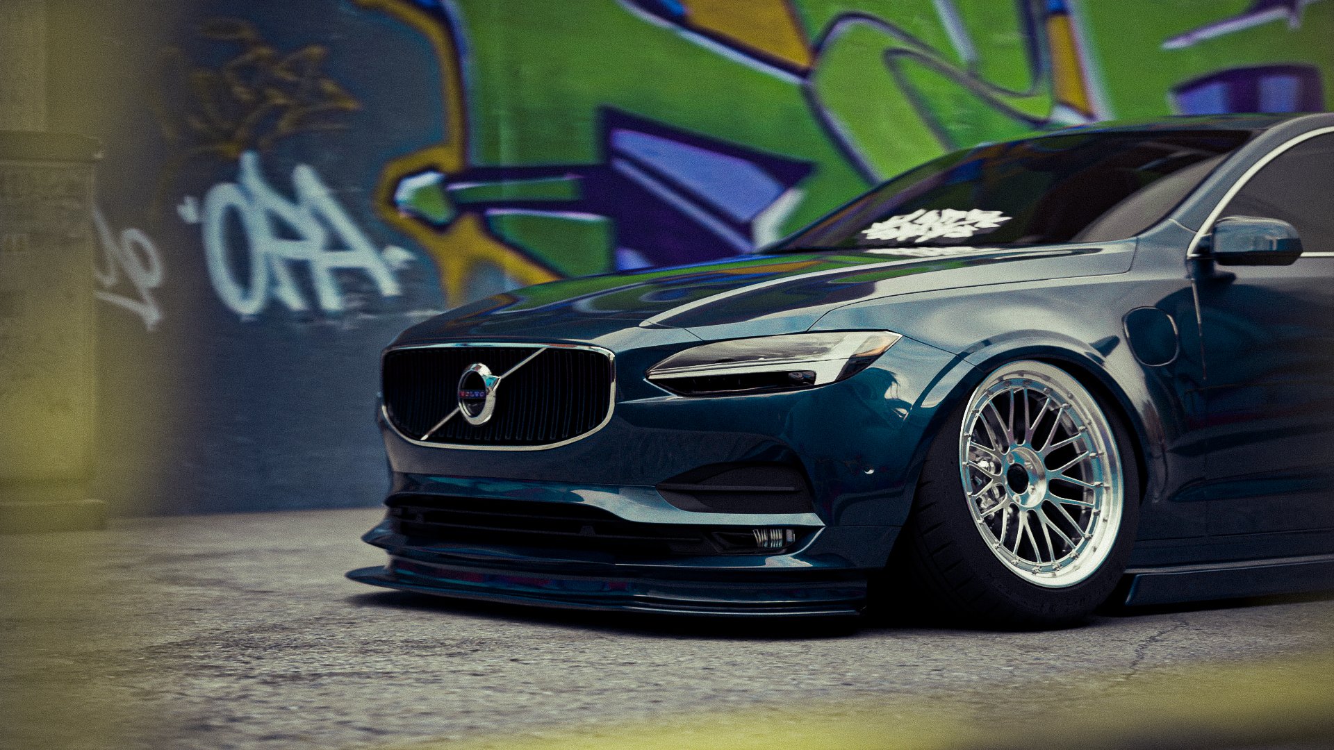 Voiture noire de luxe garée devant un mur coloré avec graffiti