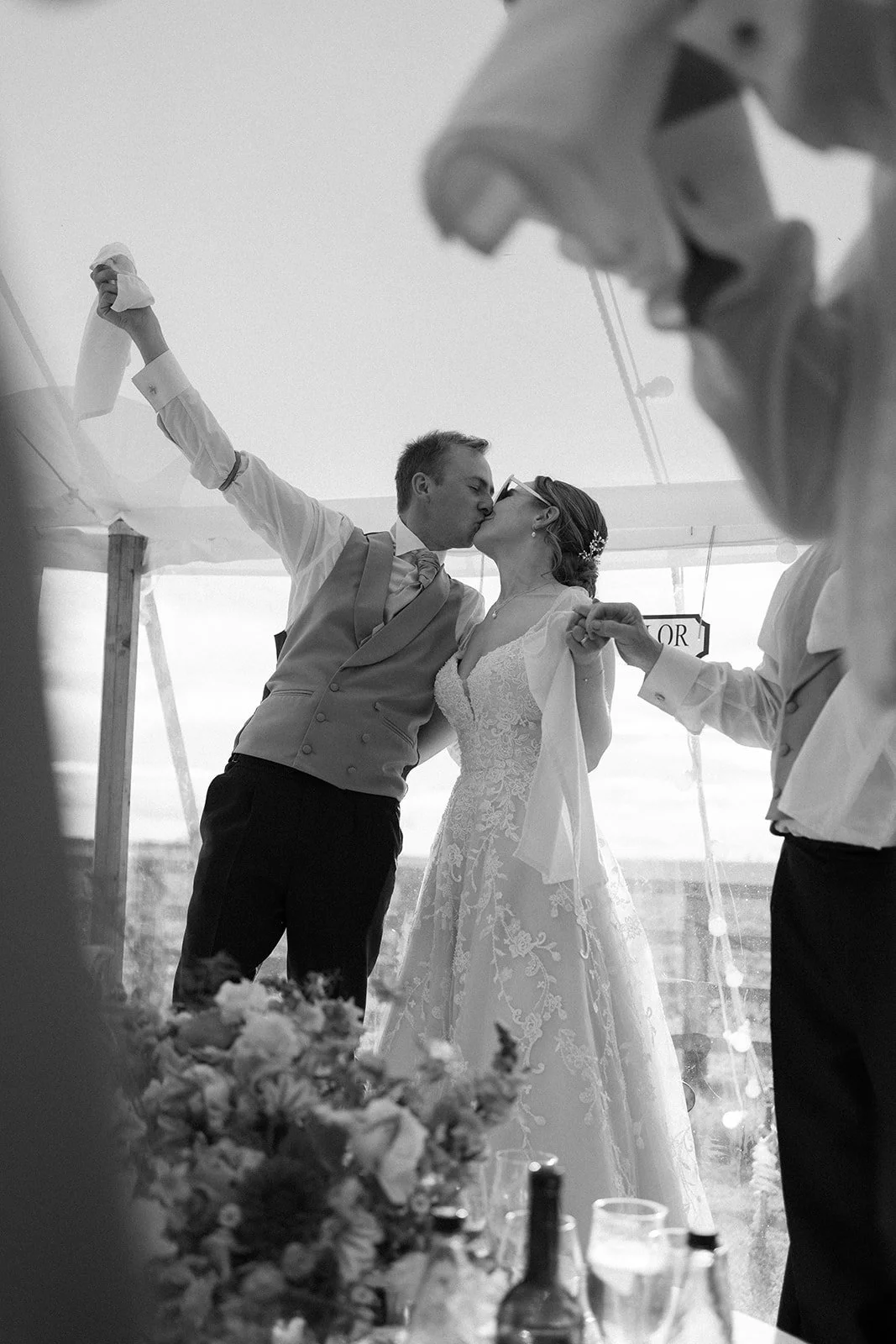 Bride and groom celebrating during wedding breakfast