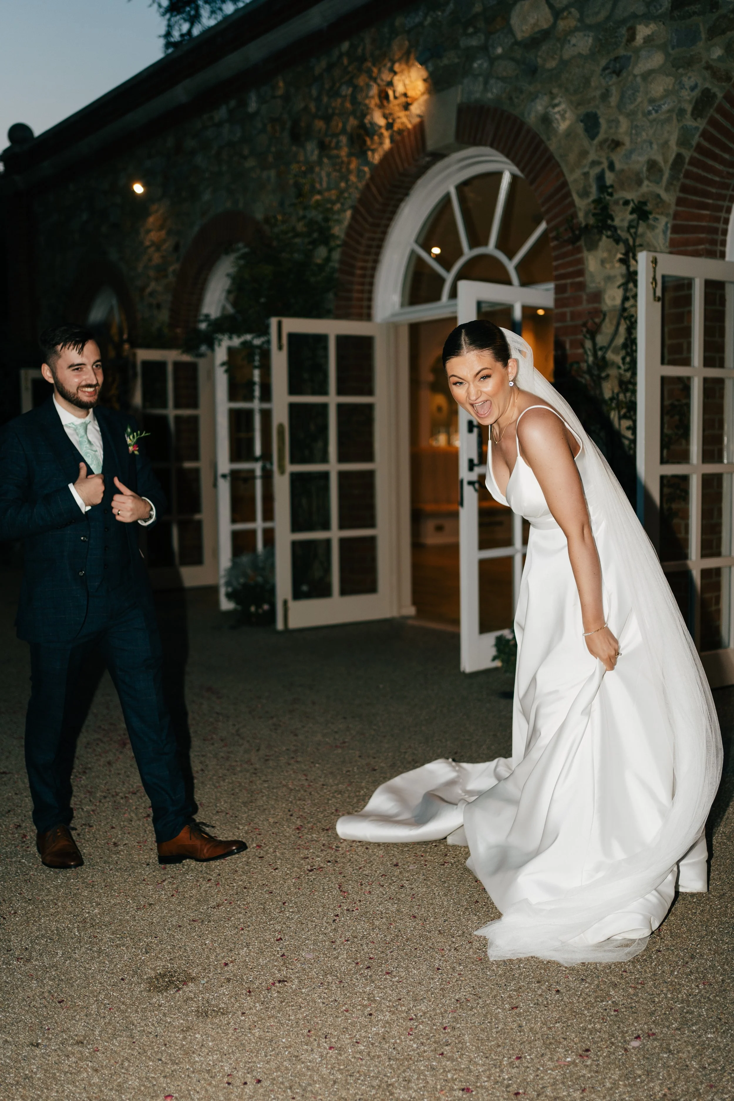 Bride and groom laughing during the night flash photography session