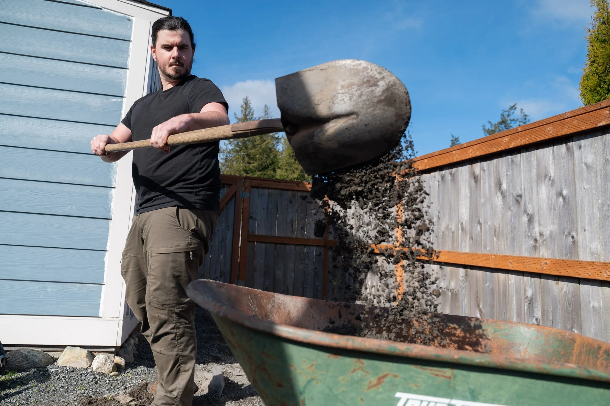 San Juan Island Handyman David Day Shoveling Gravel