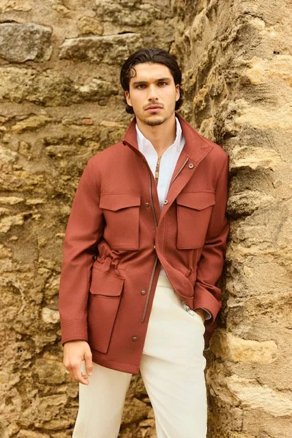 Stand out from among the crowd in this gorgeous melon colored jacket with large flap pockets. This jacket is perfect for those who want to make a statement. The large flap pockets add a unique and stylish touch, while the high-quality materials ensur